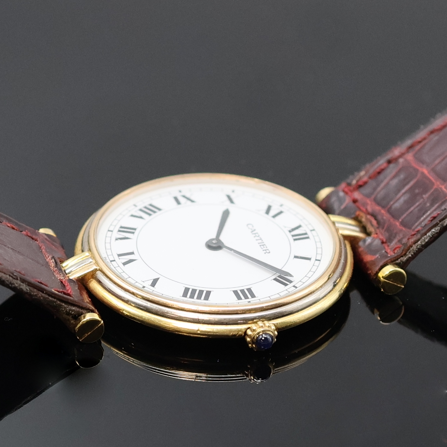 Detail c: CARTIER Vendome Trinity Armbanduhr in GG/RG/WG 750/000, Schweiz um 1995, quarz, Boden 2- fach verschr., Schmuckkrone, neutr. Lederband m. orig. ...
