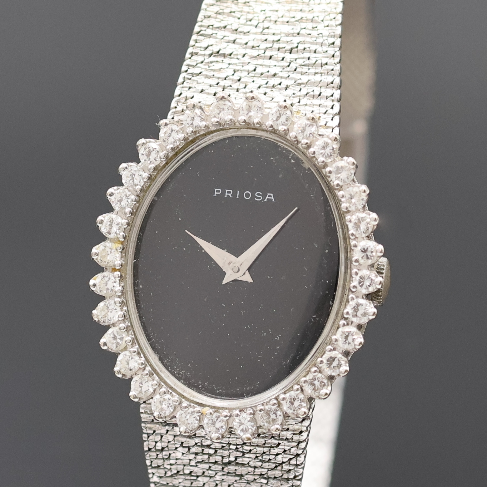 Detail a: PRIOSA Damenarmbanduhr in WG 585/000 mit Diamanten, Schweiz um 1965, Handaufzug, Boden aufgedr., Goldband, Lünette aufw. m. Diamanten bes., ...