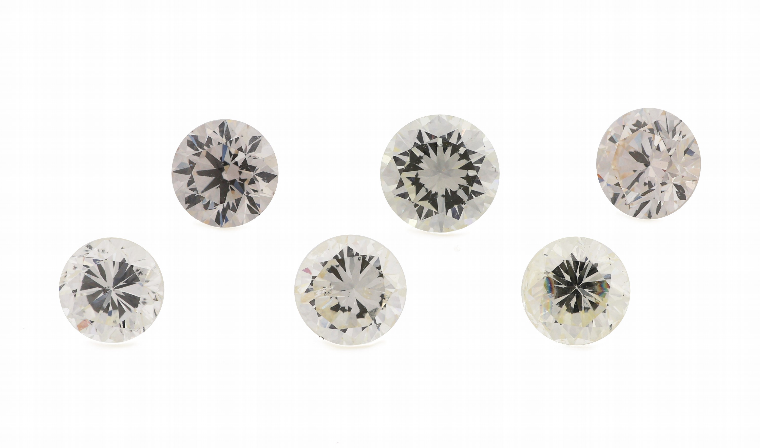 Detail b: Lot 6 lose Brillanten zus. ca. 1.93 ct l.Yellow-Yellow/si-p
