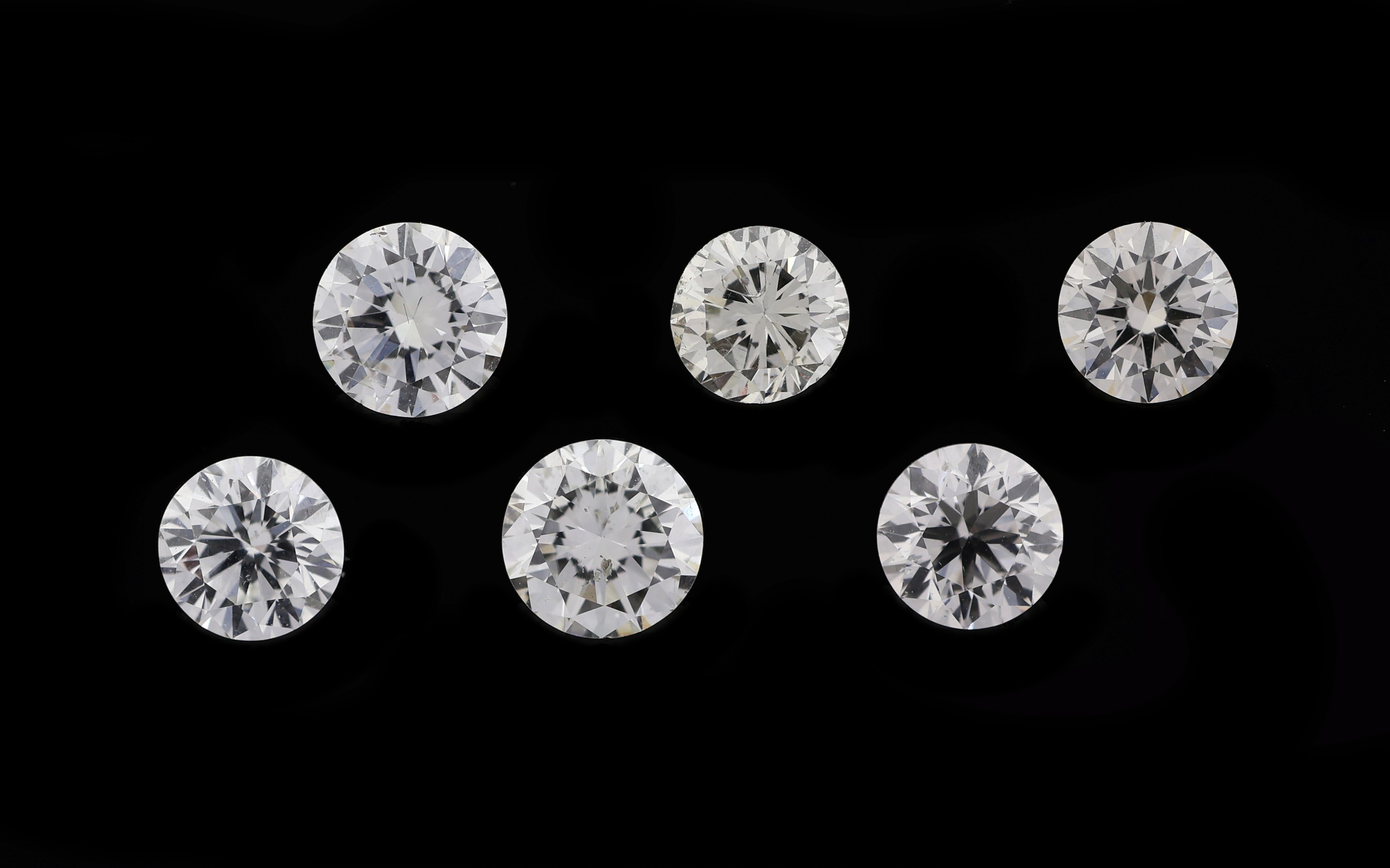 Lot 6 lose Brillanten zus. ca. 1.87 ct get. Weiß-l.Yellow/si