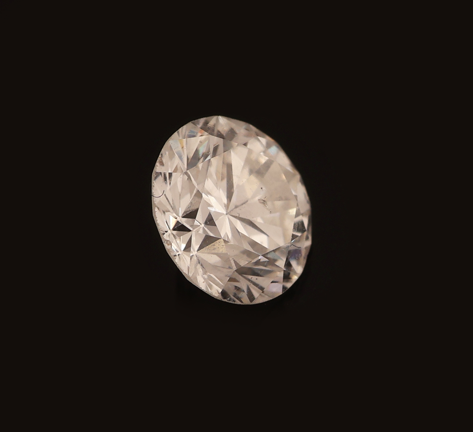 Detail b: Loser Brillant ca. 0.55 ct feines Weiß/si1