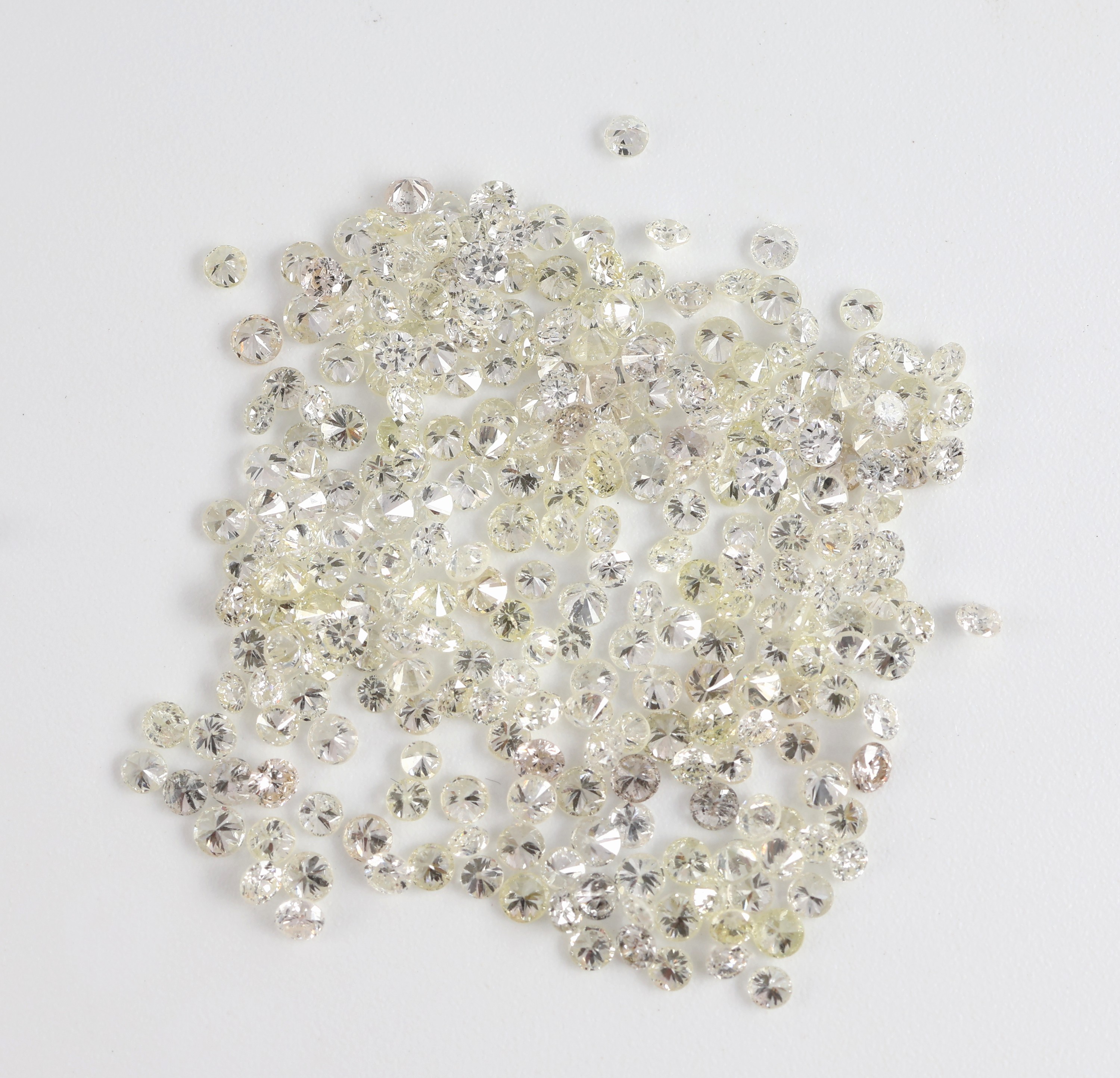 Detail b: Lot lose Brillanten, zus. ca. 7.19 ct l.get.Weiß-Yellow/p