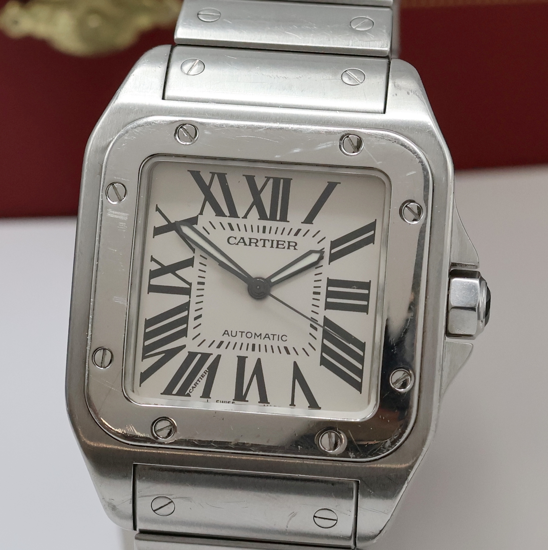 Detail a: CARTIER Armbanduhr Santos 100 Referenz 2656,Automatik, Edelstahlgeh. inkl. Gliederband m. dopp. Faltschl., Boden und Lünette 8-fach verschr., silb. ...