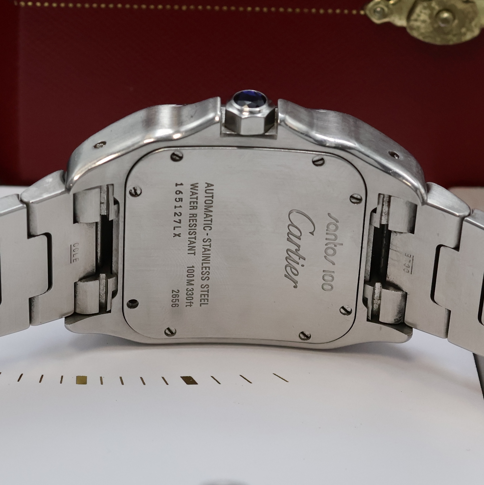 Detail d: CARTIER Armbanduhr Santos 100 Referenz 2656,Automatik, Edelstahlgeh. inkl. Gliederband m. dopp. Faltschl., Boden und Lünette 8-fach verschr., silb. ...