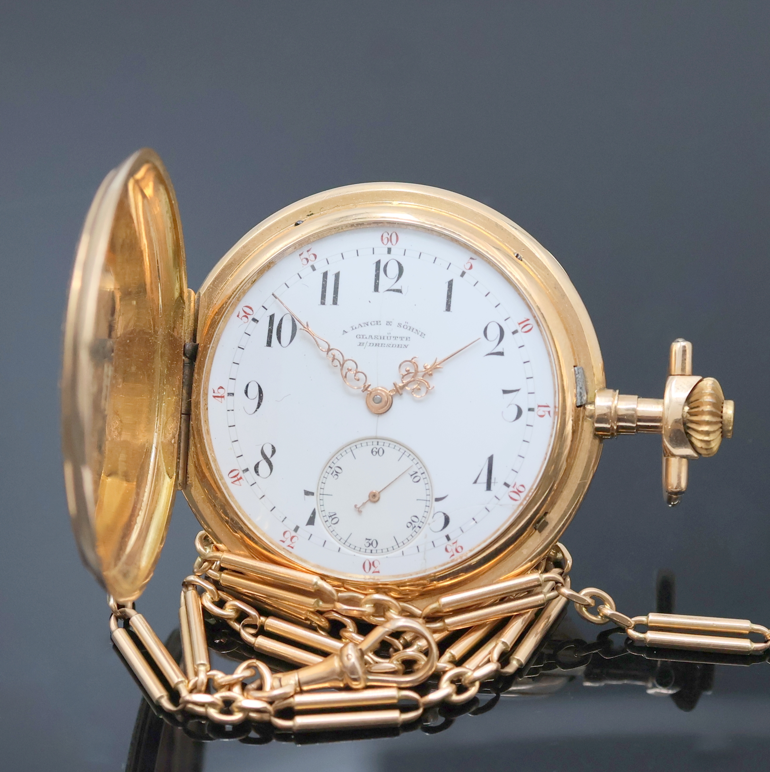 A. LANGE & SÖHNE Savonette in RG 750/000 an Uhrenkette in RG 585/000, Deutschland um 1890, grav. 3-Deckel Goldgeh., Sprungdeckel m. Monogramm, ...