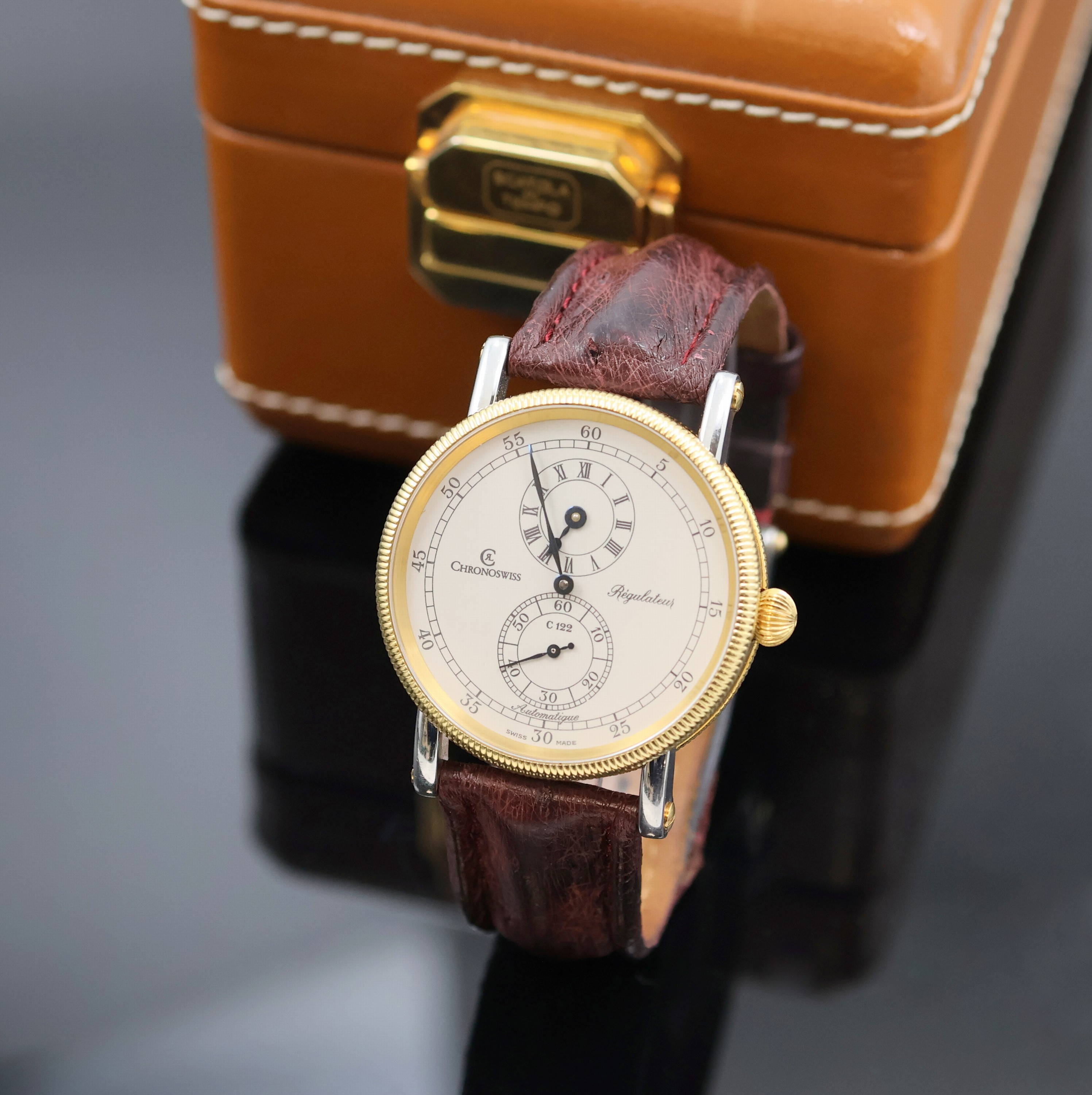 CHRONOSWISS Herrenarmbanduhr Regulateur, Automatik, Schweiz um 2000, beids. vergl. Geh. in Edelstahl/Gold kombiniert inkl. orig. Lederband m. orig. ...
