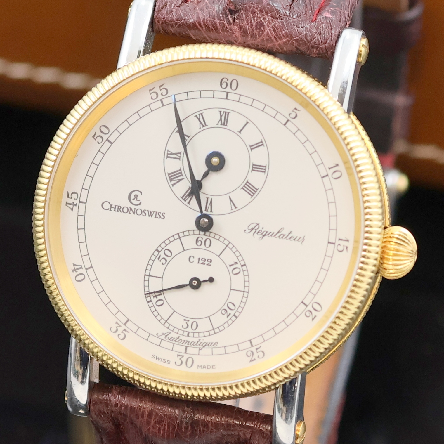 Detail a: CHRONOSWISS Herrenarmbanduhr Regulateur, Automatik, Schweiz um 2000, beids. vergl. Geh. in Edelstahl/Gold kombiniert inkl. orig. Lederband m. orig. ...