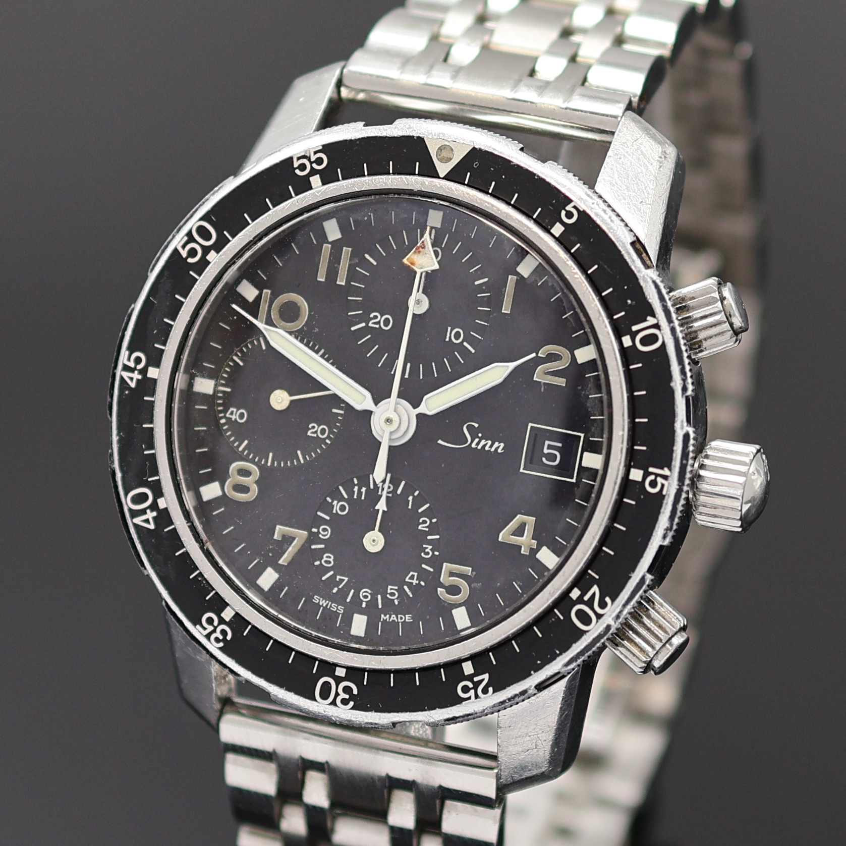 Detail a: SINN Armbanduhr mit Chronograph, Schweiz/Deutschland um 1990, beids. vergl., Boden und Drücker verschr., neutr. Gliederband m. dopp. Faltschl., ...