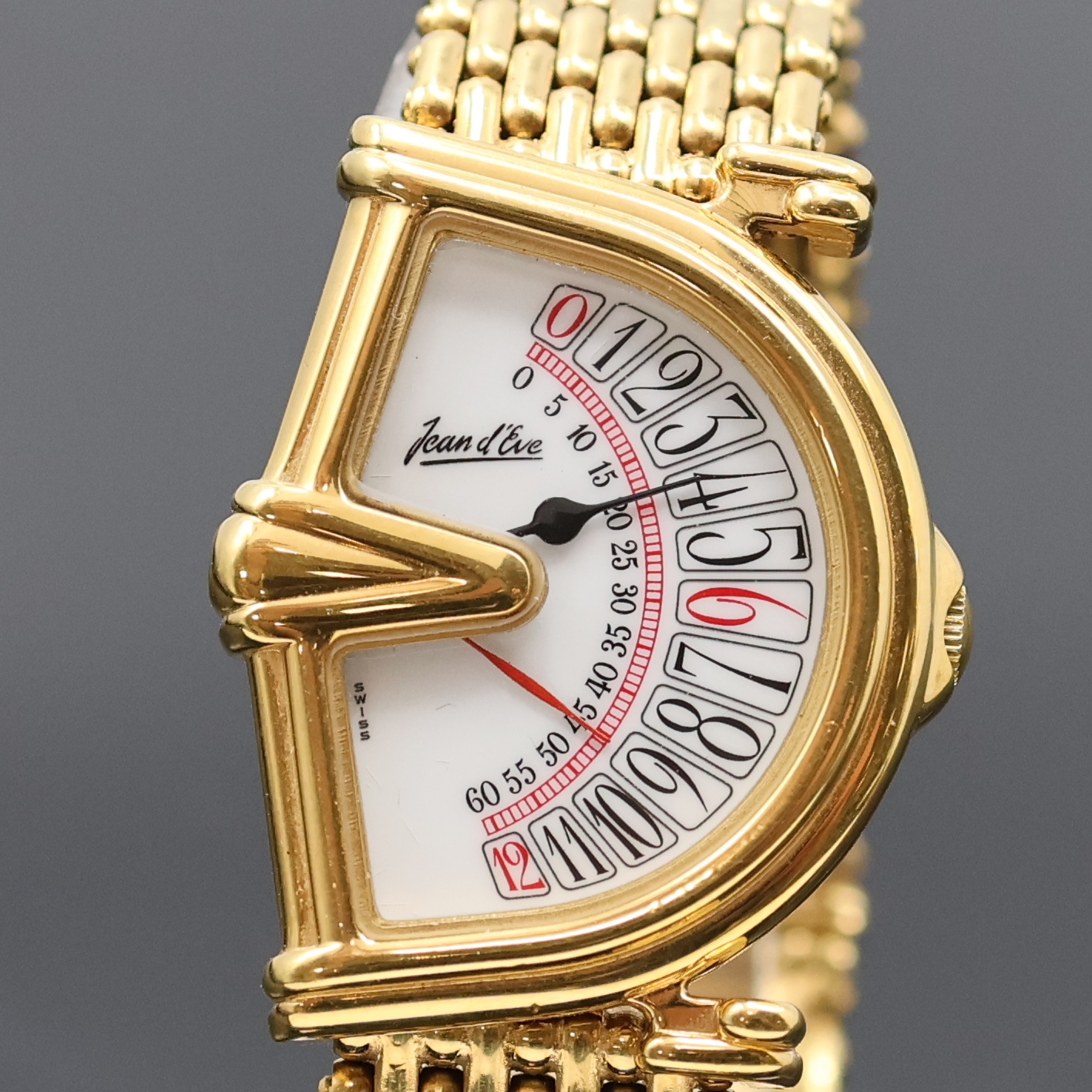 Detail a: Jean d´Eve Armbanduhr Serie Sectora, Schweiz um 1990, verg. Geh. inkl. Gliederband, quarz, Boden aufgedr., weißes Zifferbl. m. Sektorförmiger Anz. ...