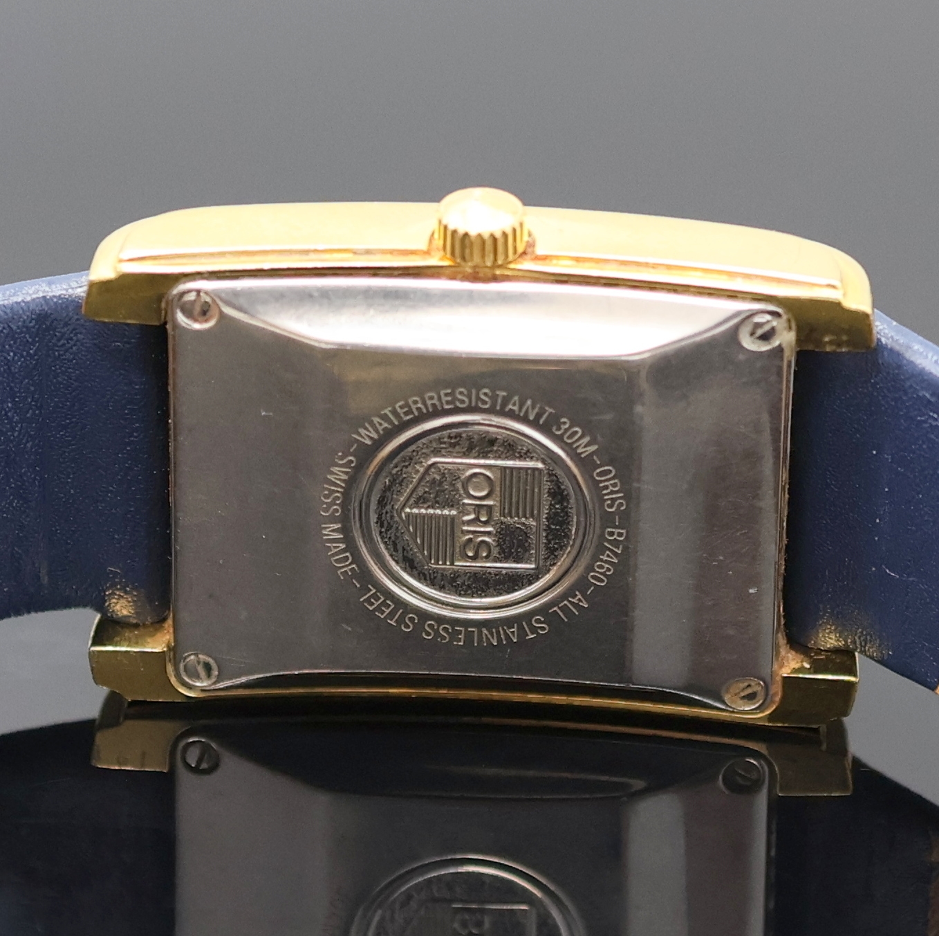 Detail d: ORIS Armbanduhr Referenz B7460, Automatik, Schweiz um 1997, verg. Edelstahlgeh. inkl. Lederband m. dopp. Faltschl., Boden 4-fach verschr., silb., z. ...