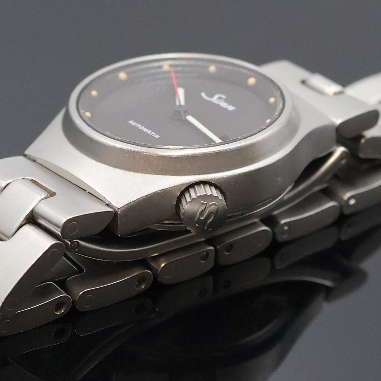 Detail c: SINN Damenarmbanduhr Referenz 344, Automatik, Schweiz / Deutschland um 2000, Edelstahlgeh. inkl. Gliederband m. dopp. Faltschl., Boden und Krone ...