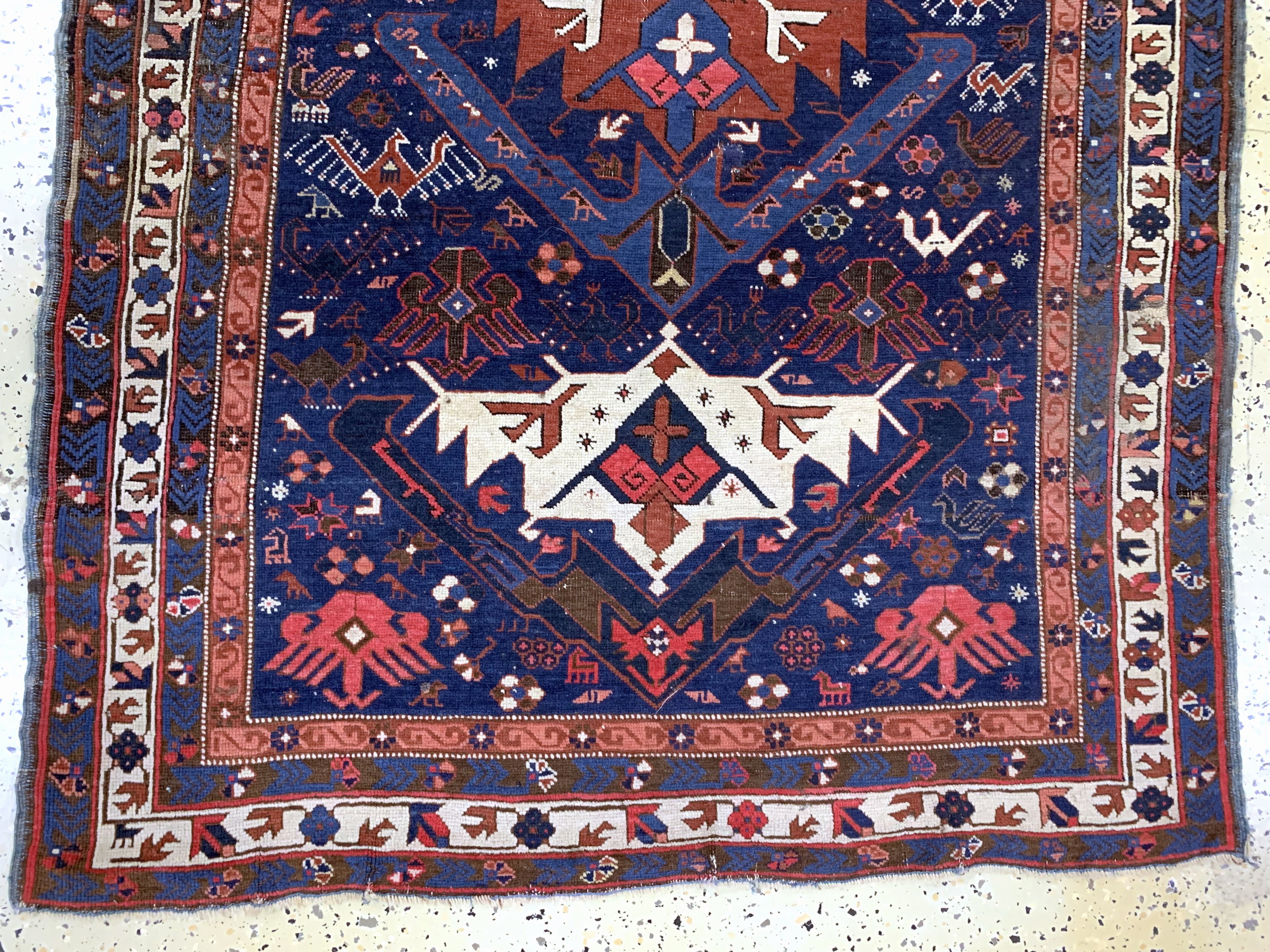 Detail c: Schirwan antik, Kaukasus, 19.Jhd, Wolle aufWolle, ca. 165 x 115 cm, EHZ: 3(kleine restaurierungen).