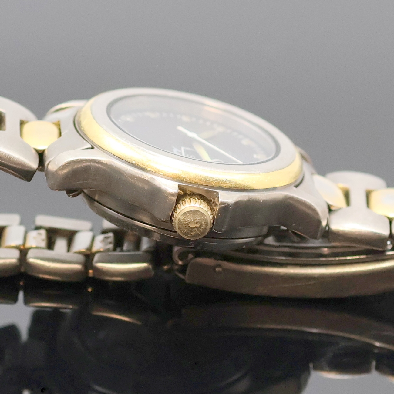 Detail c: SINN Damenarmbanduhr, Automatik, Schweiz um 1990, Titan/Gold kombiniert inkl. z. T. verg. Gliederband m. Faltschl., beids. vergl., Boden und Krone ...