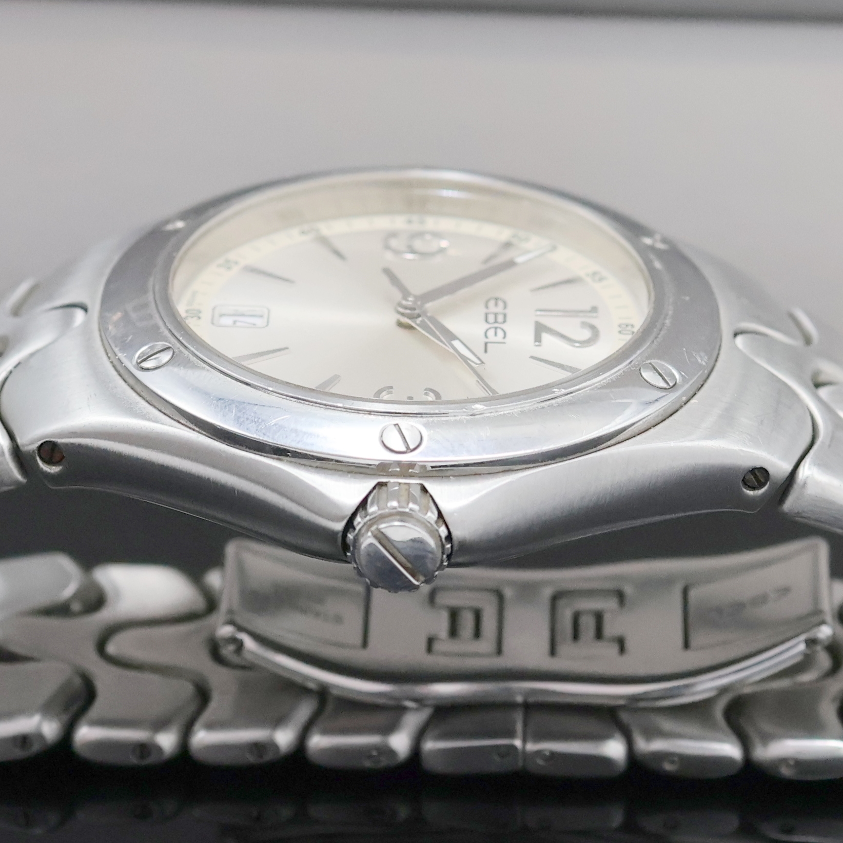Detail c: EBEL Herrenarmbanduhr Sport Wave in Stahl Referenz 9955K41, Schweiz um 2005, quarz, Boden 8-fach verschr., Gliederband m. dopp. Faltschl., silb. ...