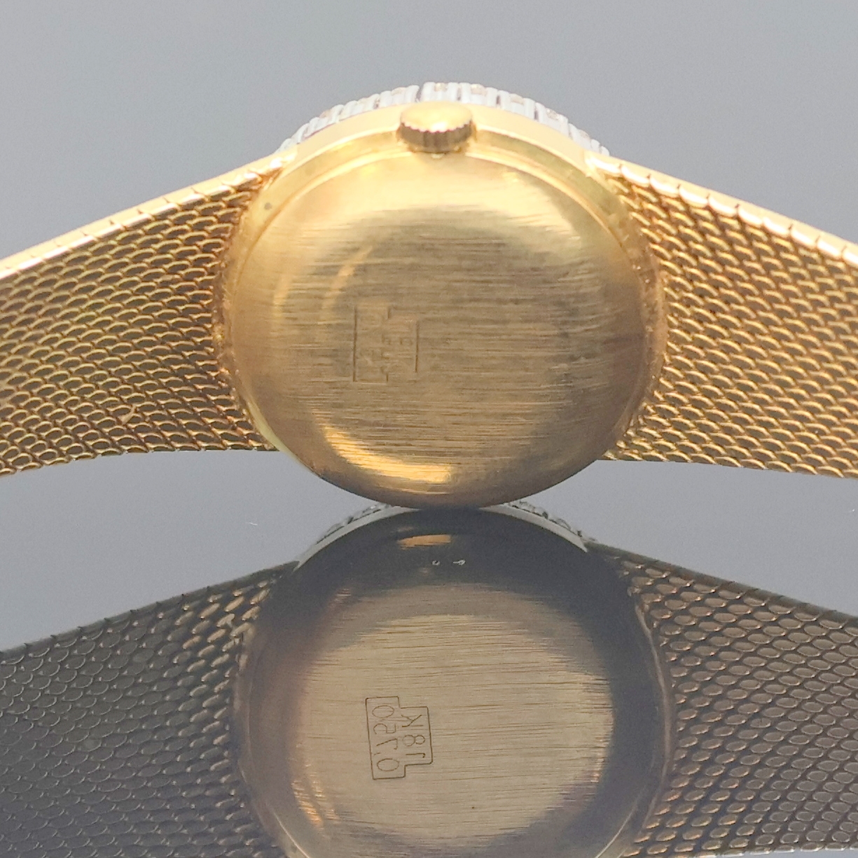 Detail d: VENUS Damenarmbanduhr in GG 750/000 mit Diamantlünette, Schweiz um 1965, Handaufzug, Goldband, Boden aufgedr., Tigeraugen- Zifferbl. geriss./besch., ...