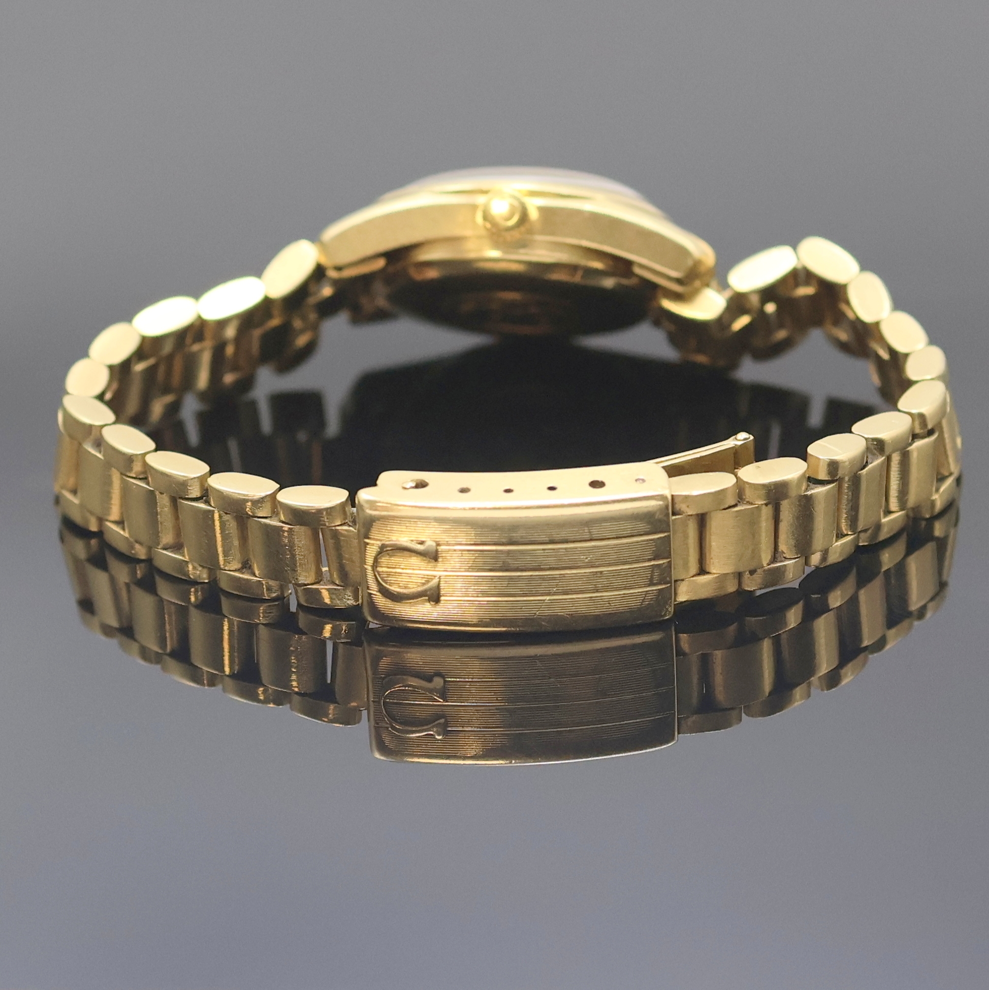 Detail b: OMEGA Seamaster Damenarmbanduhr in GG 750/000 Referenz 566.0013, Schweiz 1960er Jahre, Automatik, orig. Goldband m. Faltschl., verschr. Boden m. ...
