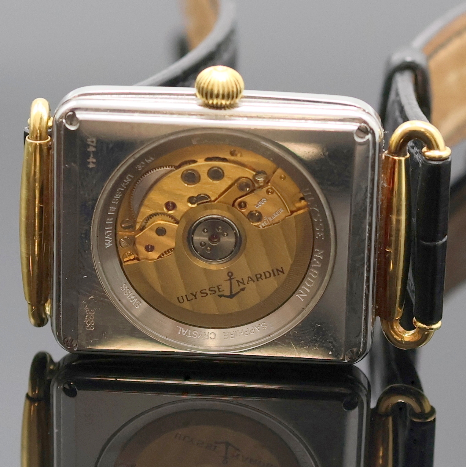 Detail d: ULYSSE NARDIN Herrenarmbanduhr Modellserie Michel Angelo Referenz 174-44, Schweiz um 1990, Automatik, Edelstahlgeh. inkl. orig. Lederband m. orig. ...