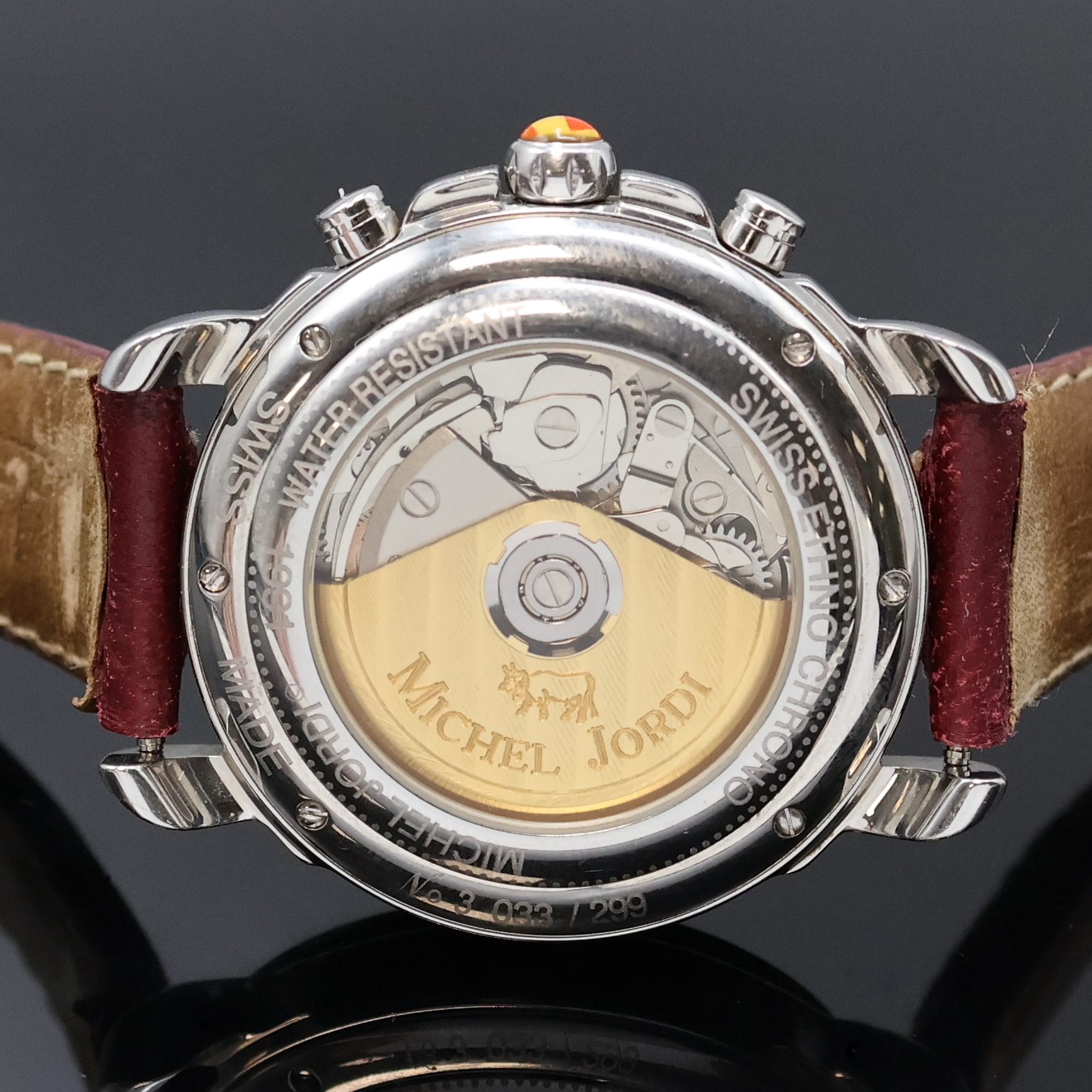 Detail d: MICHEL JORDI auf 299 Stück limitierter Armbandchronograph Ethno Chrono, Automatik, Schweiz um 1991, Edelstahlgeh. inkl. orig. Lederband m. orig. ...