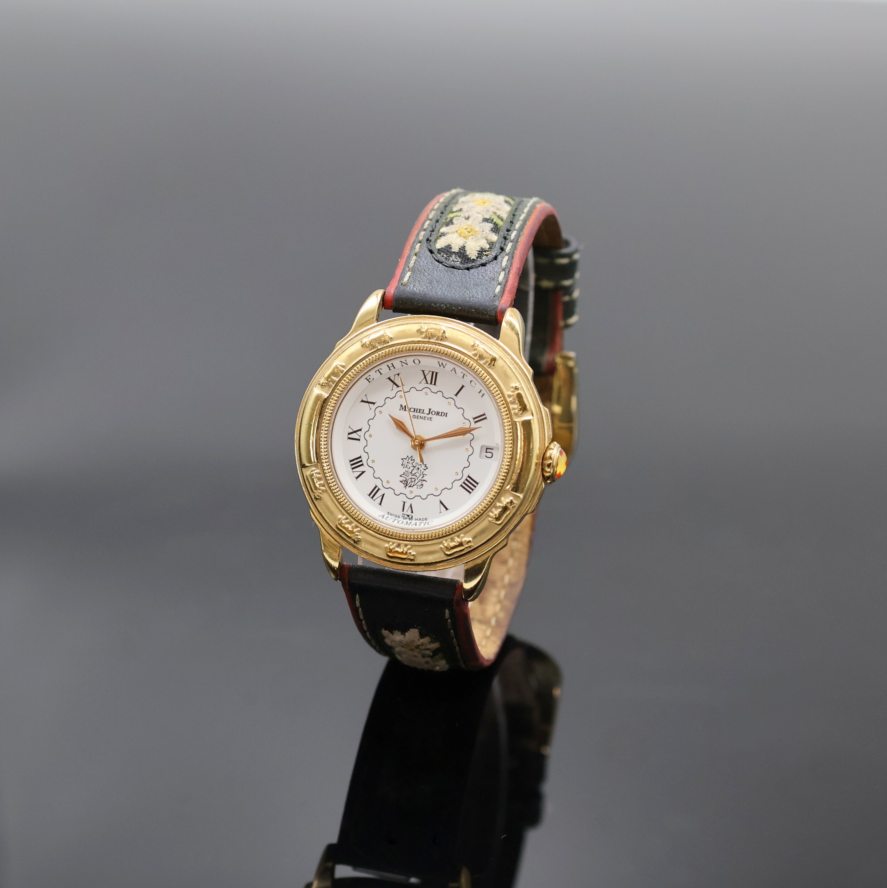 MICHEL JORDI auf 9999 Stück limitierte Armbanduhr, Automatik, Schweiz um 1991, verg. Geh. inkl. orig. Lederband (zu ern.) m. orig. Dornschl., beids. ...