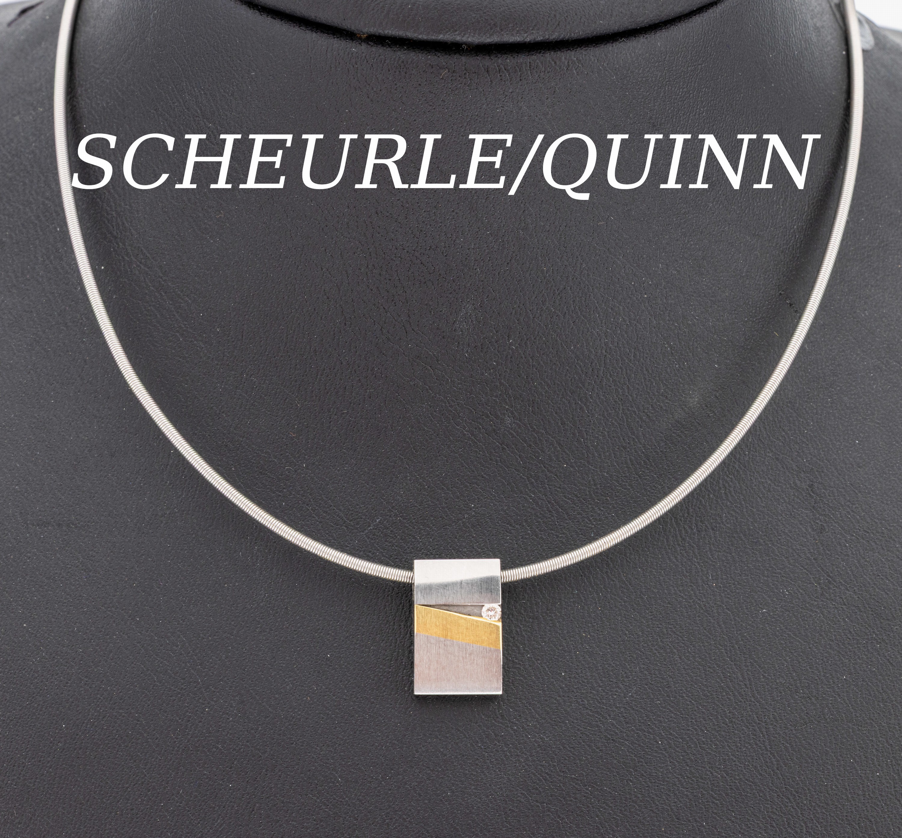 SCHEURLE/QUINN Brillant-Anhänger, Stahl undGG 750/000, kl Brillant ca. 0.04 ct Weiß/si, an Stahlreif, L. ca. 42 cm, Steckschließe