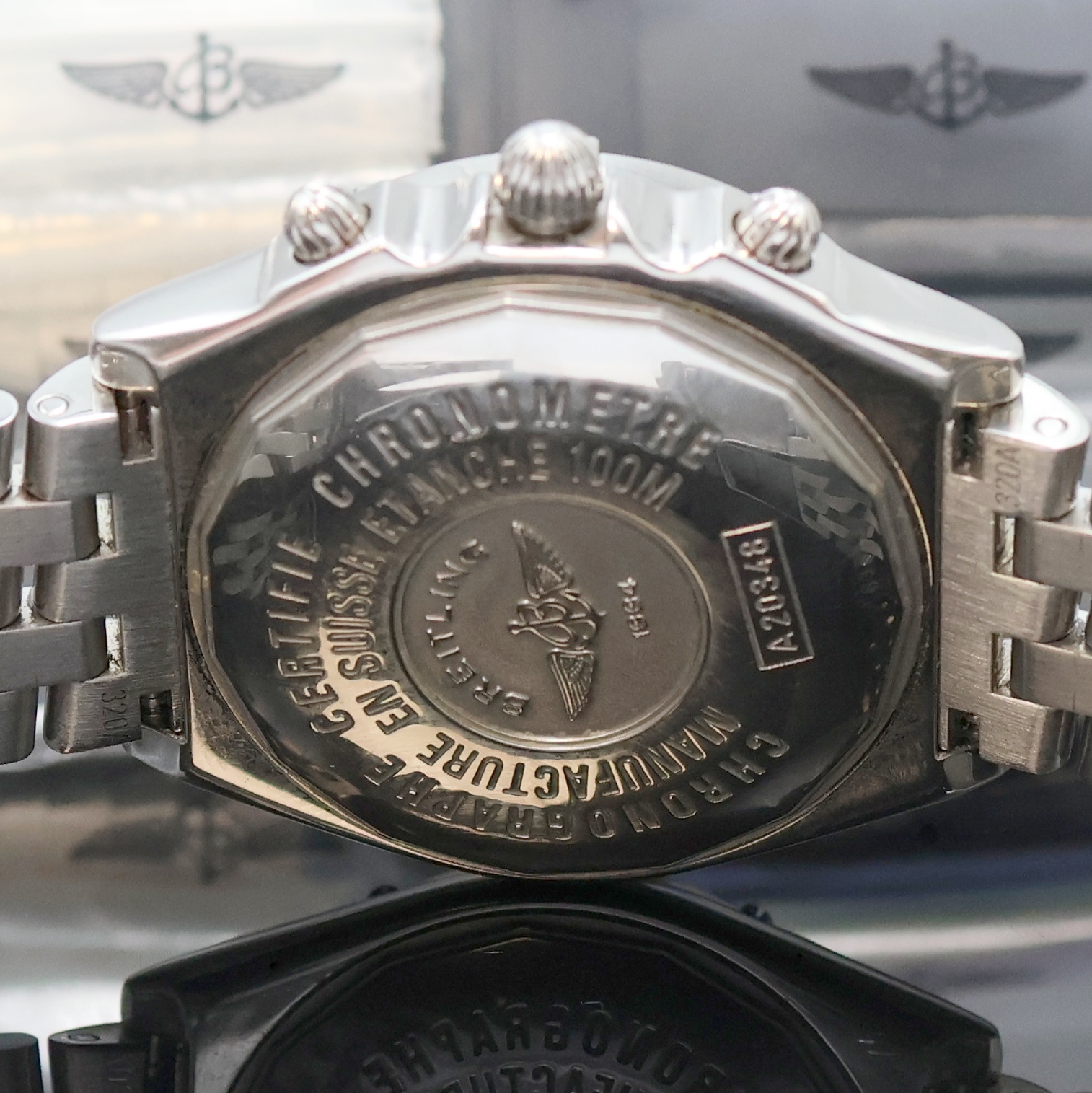 Detail d: BREITLING Chronomat Longitude Chronometer Armbandchronograph in Stahl Referenz A20348, Schweiz um 2000, Automatik, Boden u. Krone verschr., Pilotband ...