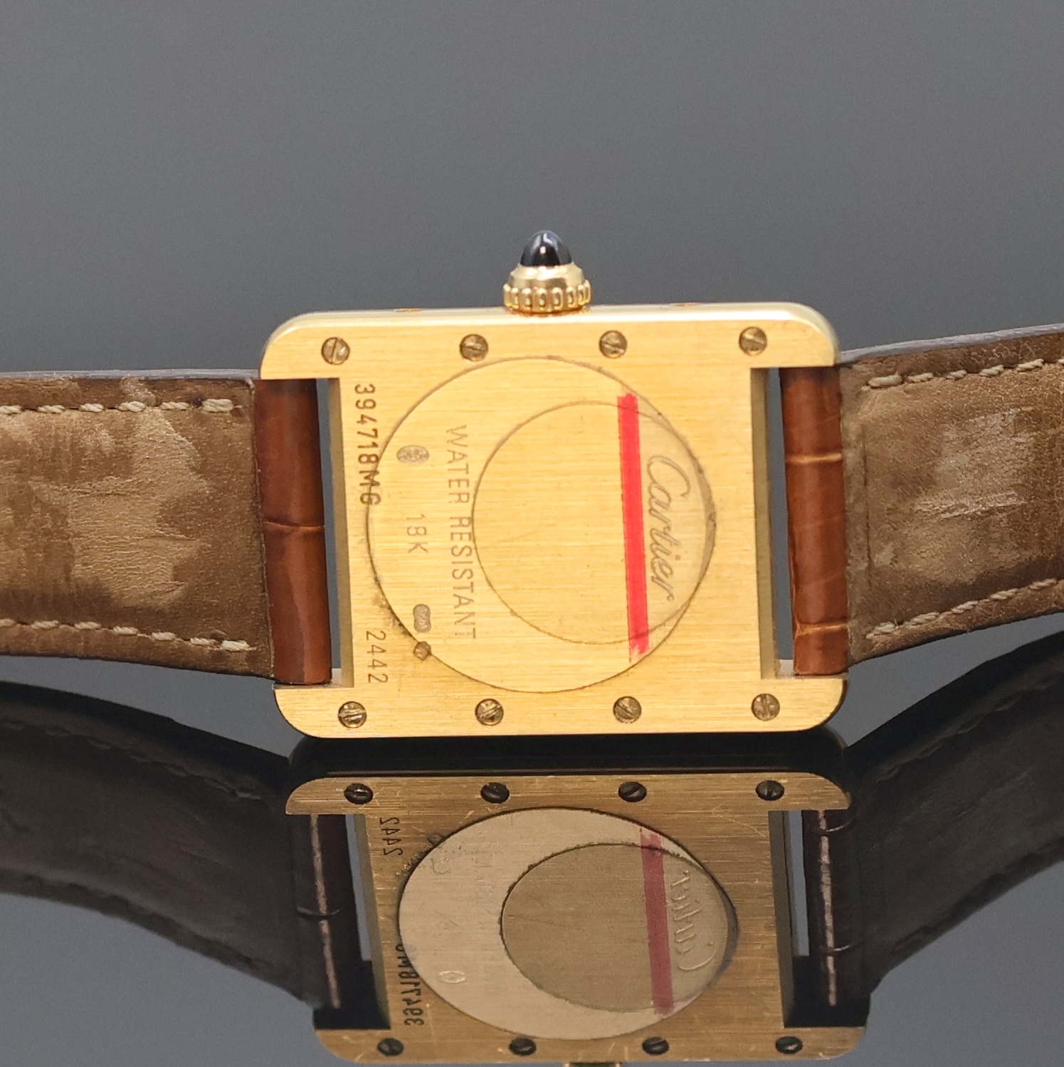 Detail d: CARTIER Damenarmbanduhr Tank Louis Cartier in GG 750/000 Referenz 2442, Schweiz um 2010, quarz, Boden 8-fach verschr., orig. Lederband m. orig. GG ...