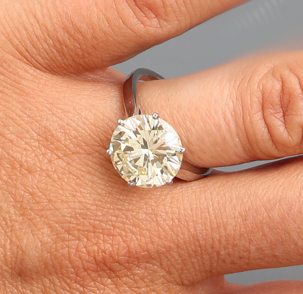 Detail f: 18 kt Gold Brillant-Ring, WG 750/000, Brillant 6.21 ct get.-light yellow (S-Z)/vvs2,Proportionen gut, Symmetrie und Politur sehr gut, Fluoreszenz ...
