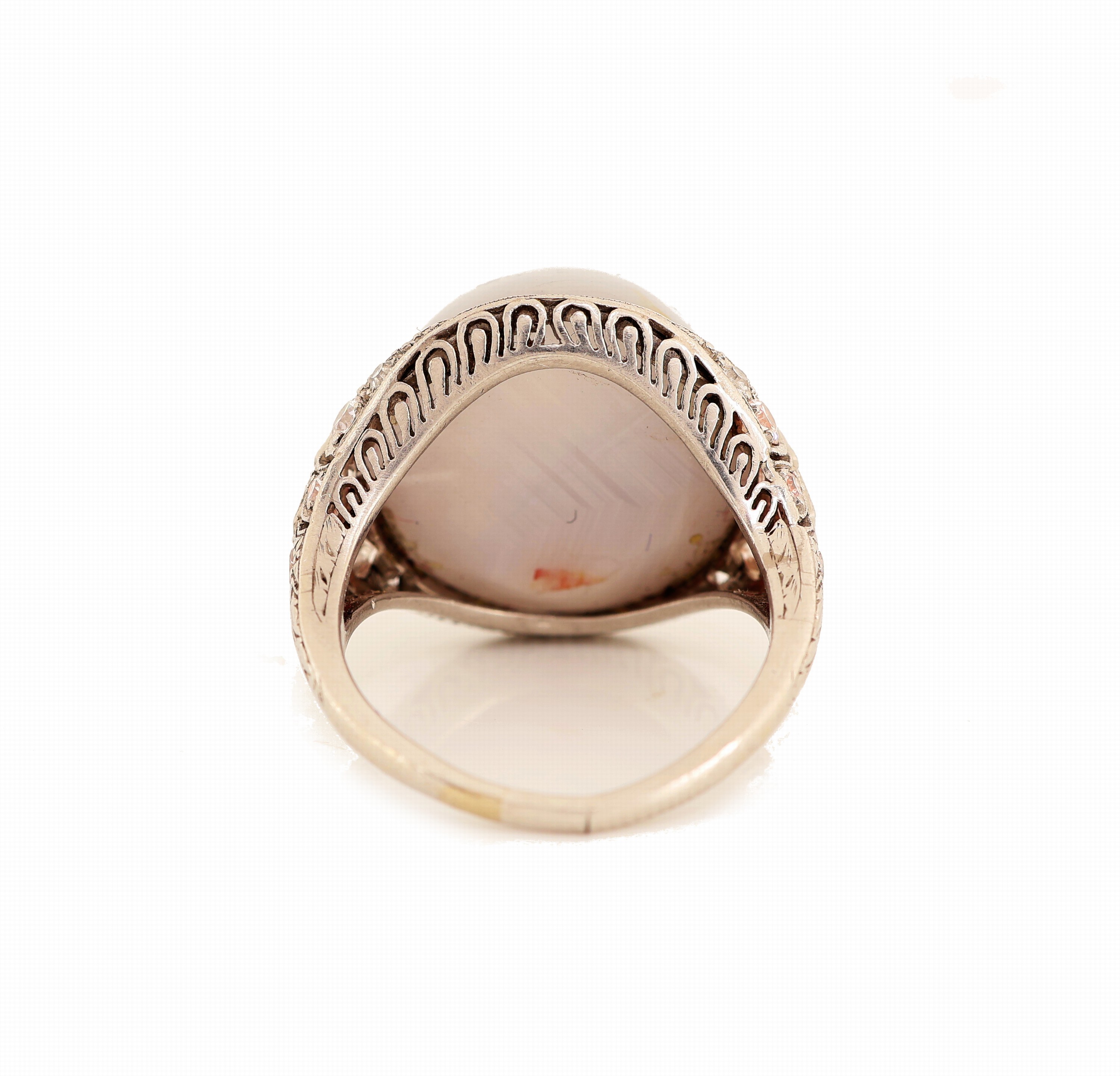 Detail d: Platin Art Deco Saphir-Diamant-Ring, um 1920, Pt. gepr., mittig ein Sternsaphircabochon ca. 20.0 ct, Ringschultern bes. mit Diamanten und ...