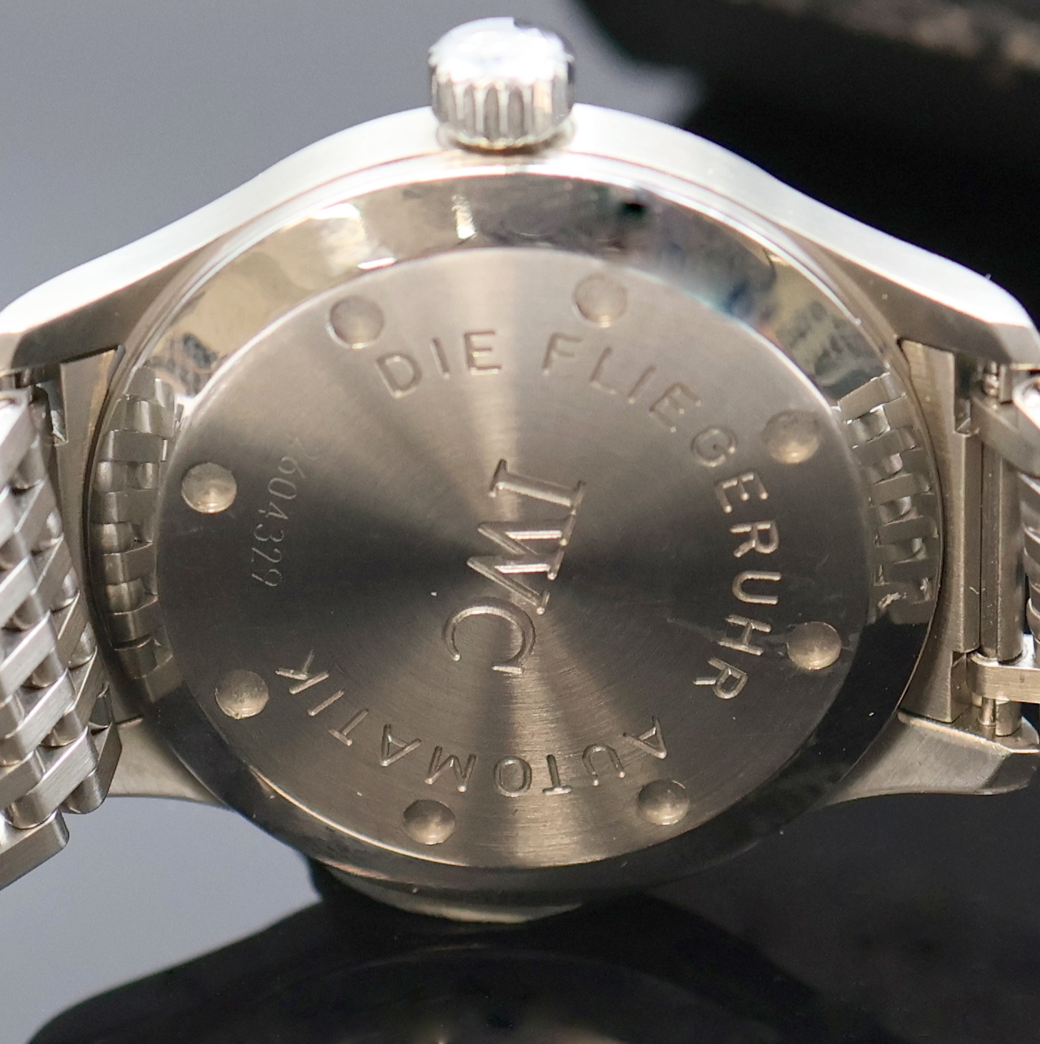 Detail d: IWC "Die Fliegeruhr" Mark XII Referenz 3240,Automatik, Schweiz um 1995, Edelstahlgeh. inkl. Gliederband m. dopp. Faltschl., Boden und Krone ...
