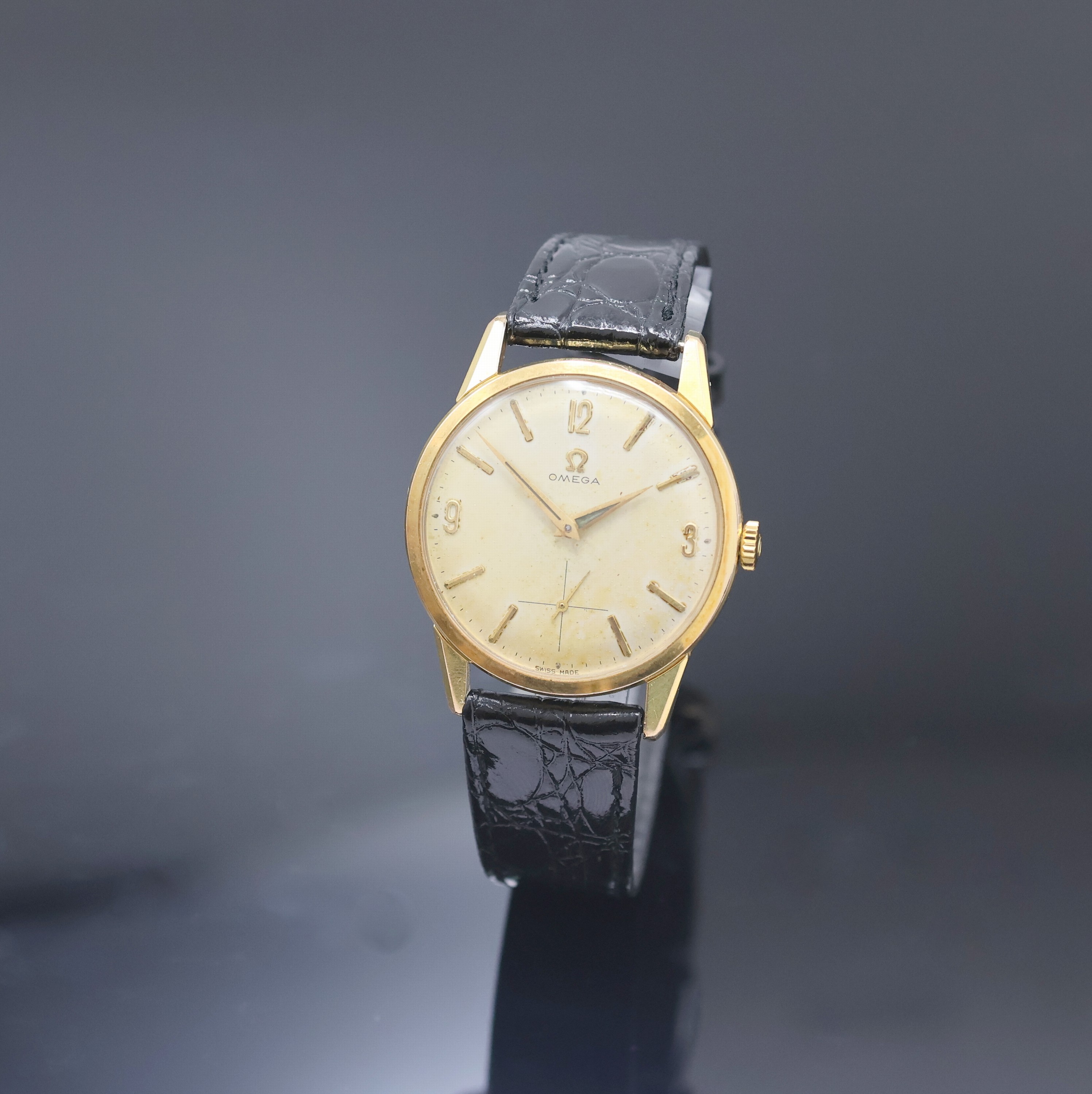 Omega Herrenarmbanduhr Referenz 14391-62, Handaufzug, Schweiz um 1962, verg. Geh., Edelstahlboden aufgedr., silb. Zifferbl. m. aufgel. Indizes ...