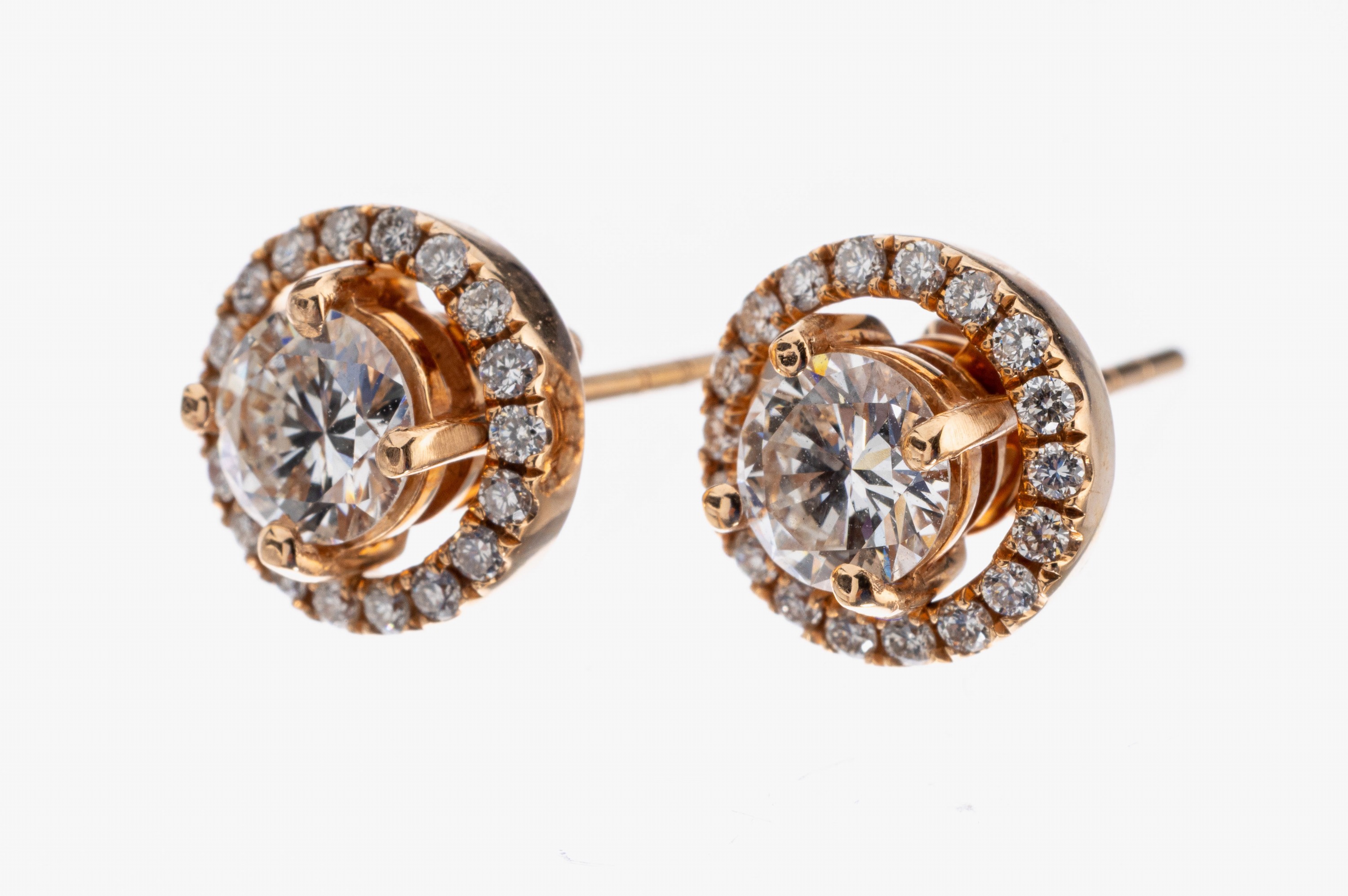 Paar 18 kt Gold Brillant-Ohrstecker, RG 750/000, 2 Brillanten zus. ca. 1.10 ct Weiß/vs-si, abnehmbarer Kranz aus Brillanten zus. ca. 0.30 ct ...