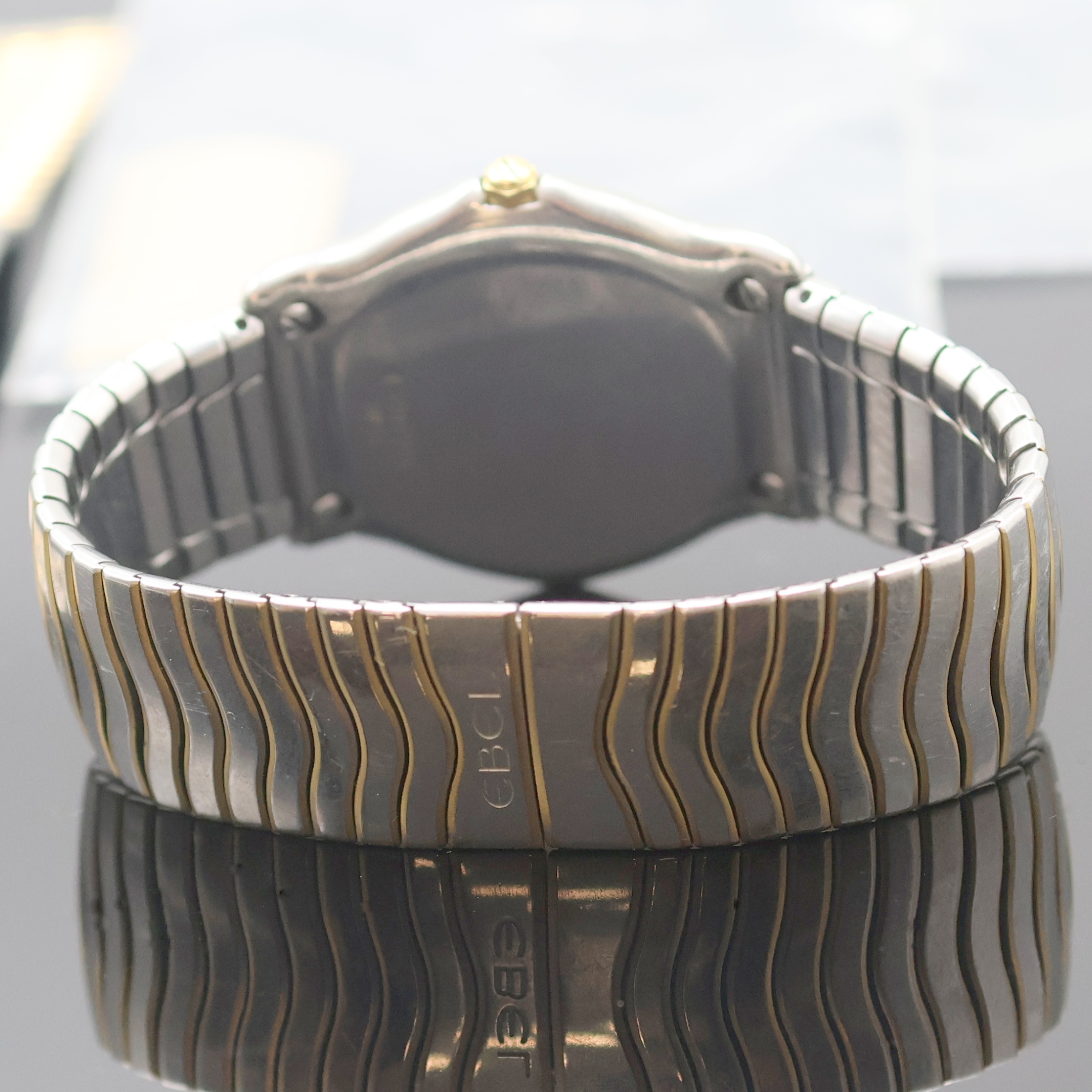 Detail b: Ebel Sportwave Armbanduhr in Stahl/Gold Referenz 1187141, Schweiz um 1995, quarz, Monocoque Geh., orig. Wellengliederband m. dopp. Faltschl., ...