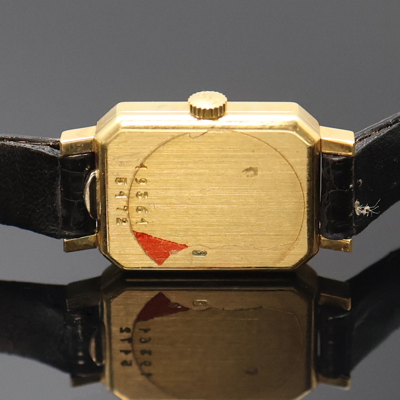 Detail d: CHOPARD Damenarmbanduhr in GG 750/000, Schweiz um 1975, quarz, Boden aufgedr., orig. Lederband m. verg. Dornschl., goldfarb. Zifferbl. m. gold. ...