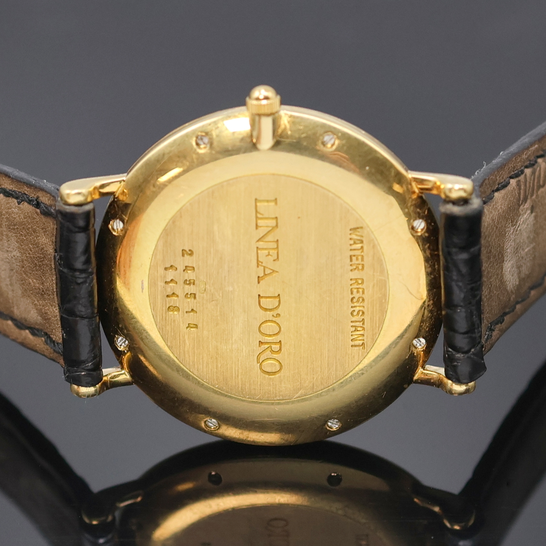 Detail d: CHOPARD Armbanduhr Linea D´Oro in GG 750/000 Referenz 1118, Schweiz um 1998, quarz, orig. Lederband m. verg. Dornschl., Boden gegen Lünette 8-fach ...