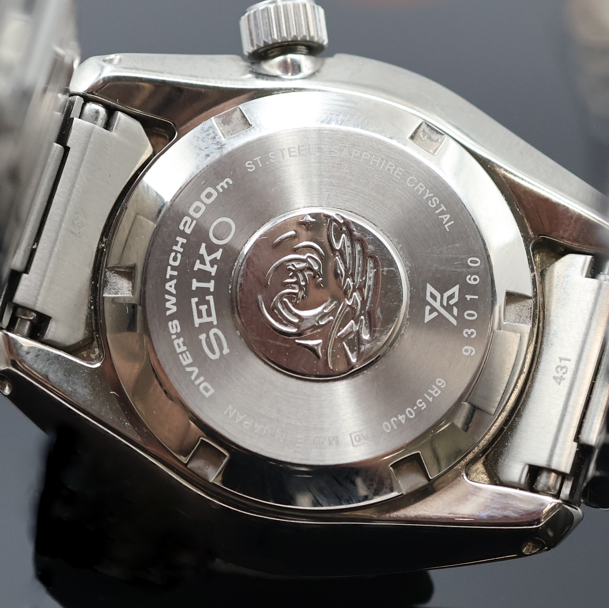 Detail d: SEIKO Prospex Divers Herrenarmbanduhr Referenz 6R15.04J0, Japan um 2010, Automatik, Edelstahlgeh. inkl. orig. Gliederband m. Faltschl., Boden u. ...