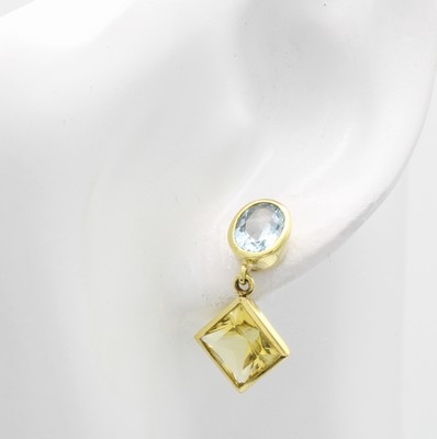 26967646a - Paar Ohrstecker mit Farbsteinen, GG 585/000, 2 ovale Aquam. zus. ca. 1.8 ct, 2 gelbe ...