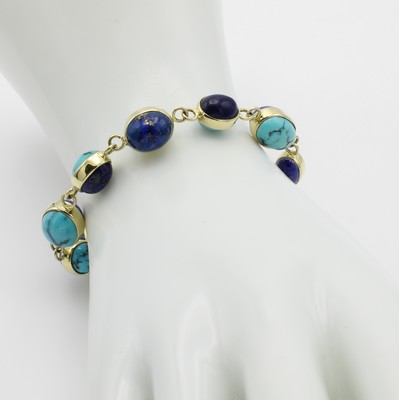 26967857a - Armband mit Farbsteinen, GG 585/000, Türkise zus. ca. 32 ct, Lapislazuli zus. ca. 35 ...