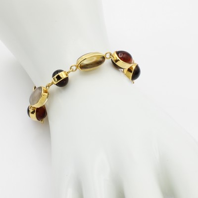 26968401a - Armband mit Citrinen und Rauchquarzen, GG 585/000, Farbsteincabochons in versch. Formen ...