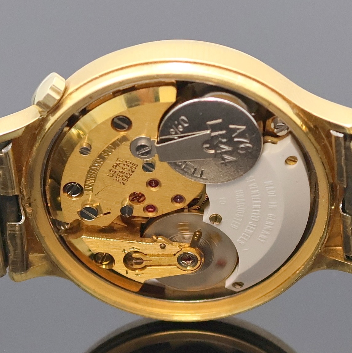 Detail d: JUNGHANS Herrenarmbanduhr Electronic DATO- CHRON, Deutschland um 1970, Metall hartverg., an Elasto-Fixo Band, Zentralsek., Edelstahlboden verschr., ...