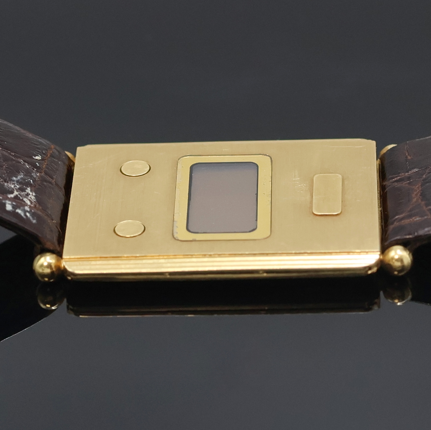Detail c: DUGENA ultraflache Armbanduhr in GG 750/000 Referenz 87135 295, Schweiz um 1978, orig. Lederband m. verg. orig. Dornschl., LCD Display, Kal. ESA ...
