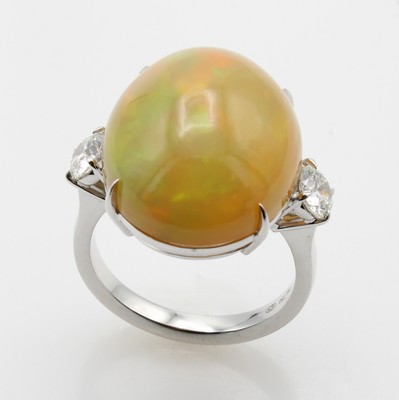 26969936a - Ring mit Opal und Brillanten, WG 750/000, Opal ca. 12.30 ct, 2 Brill. zus. ca. 0.64 ct ...