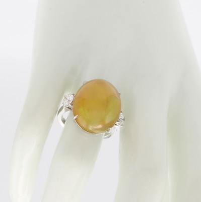 26969936b - Ring mit Opal und Brillanten, WG 750/000, Opal ca. 12.30 ct, 2 Brill. zus. ca. 0.64 ct ...