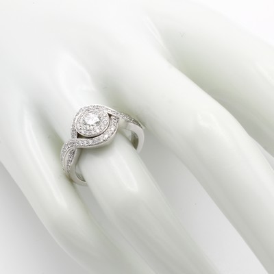 26969955a - Ring mit Brillanten, WG 750/000, geschwungenes, überkreuztes Design, 1 Brill. ca. 0.50 ...