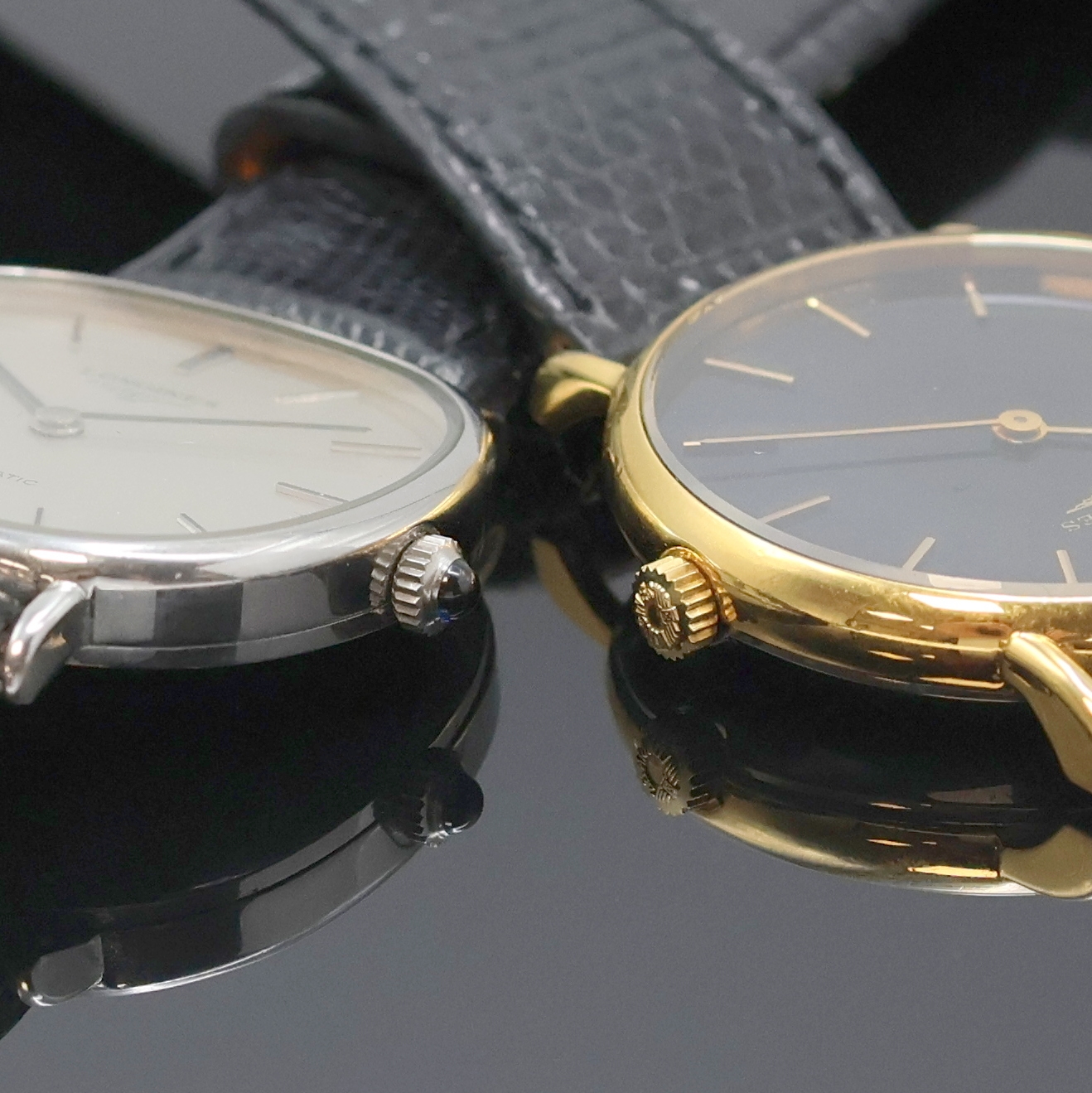 Detail d: LONGINES 2 Armbanduhren in Stahl /vergoldet, Schweiz um 1980/1990, Automatik/Handaufzug, 2-teil. Geh., Stahlböden aufgedr., 1) Automatik, ovales ...