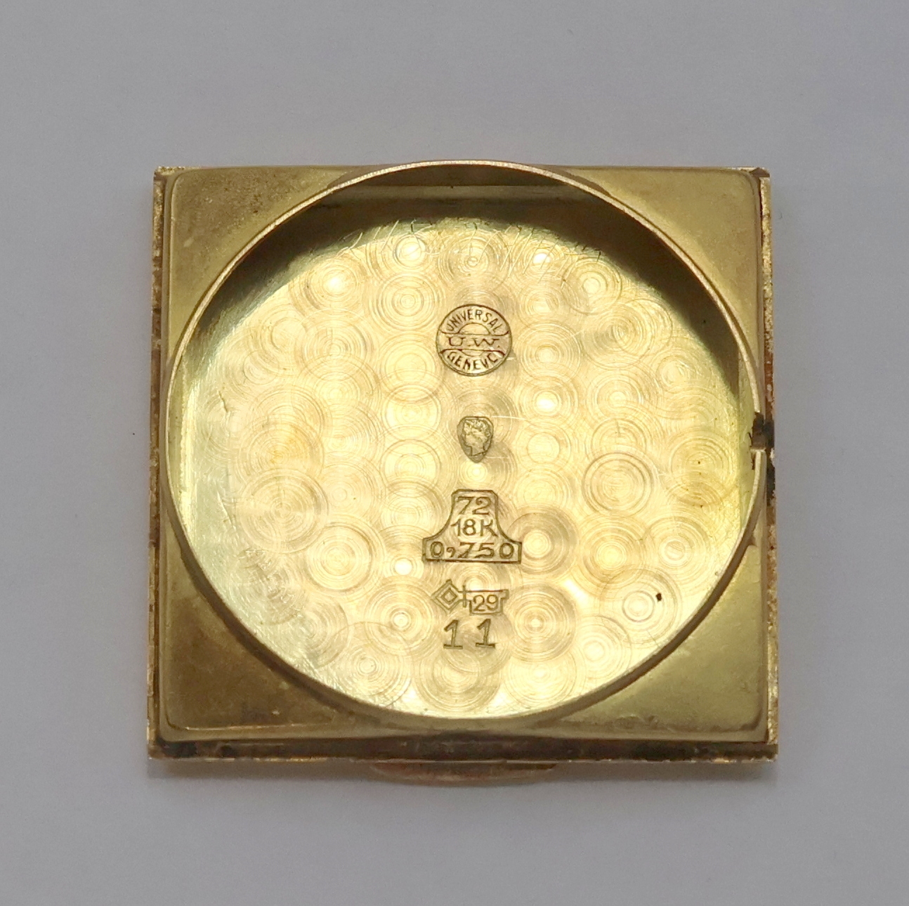 Detail h: UNIVERSAL Geneve quadratische Armbanduhr mit verdeckten Anstößen in GG 750/000 Referenz 6196, Schweiz um 1940, Handaufzug, 2-teil. Geh., Boden ...