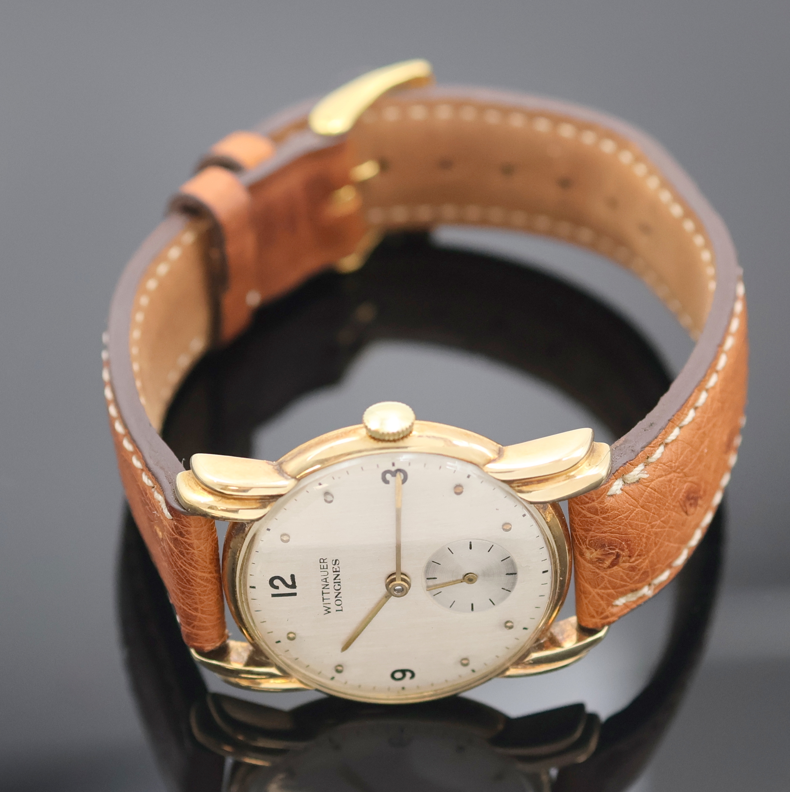 Detail c: WITTNAUER Armbanduhr in GG 750/000 mit restauriertem Zifferblatt, Schweiz um 1945, Handaufzug, 2-teil. Geh. m. ausgefallenen Anstößen, Boden ...