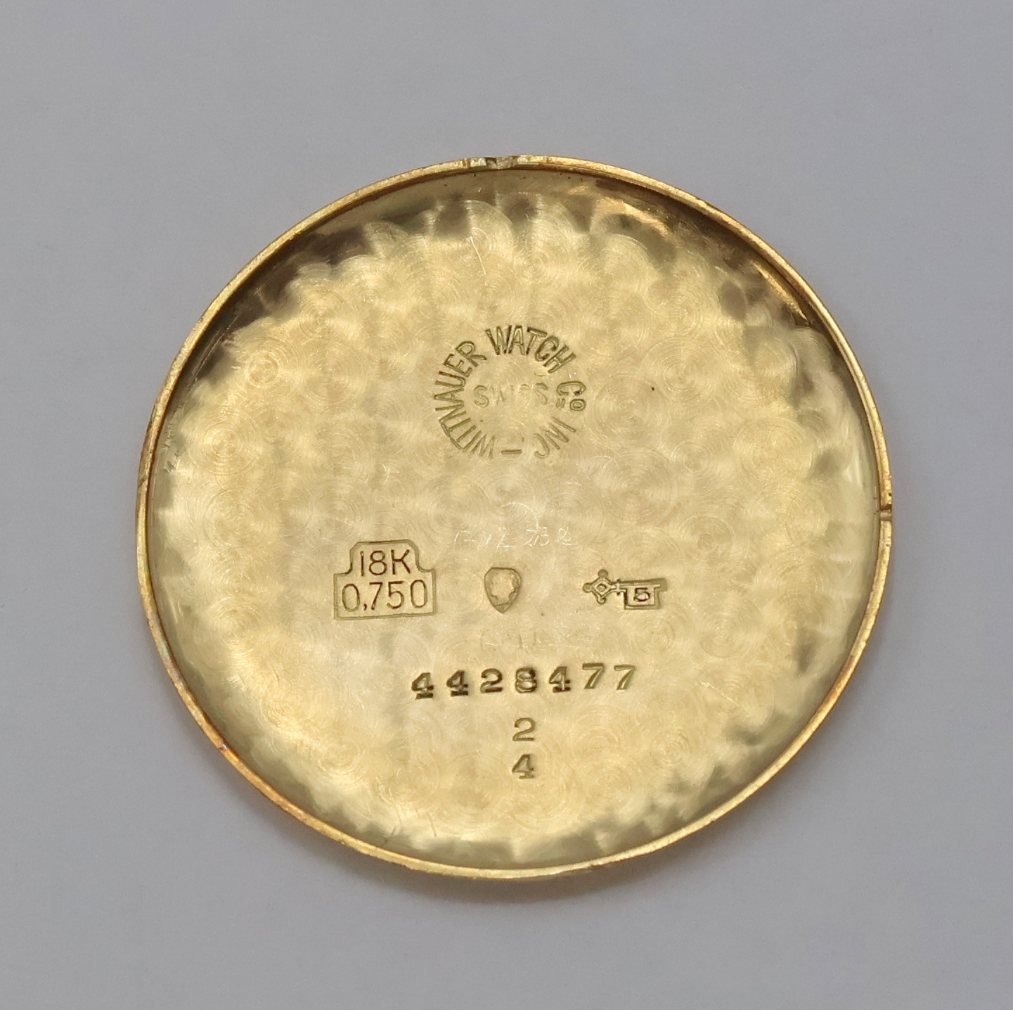 Detail h: WITTNAUER Armbanduhr in GG 750/000 mit restauriertem Zifferblatt, Schweiz um 1945, Handaufzug, 2-teil. Geh. m. ausgefallenen Anstößen, Boden ...