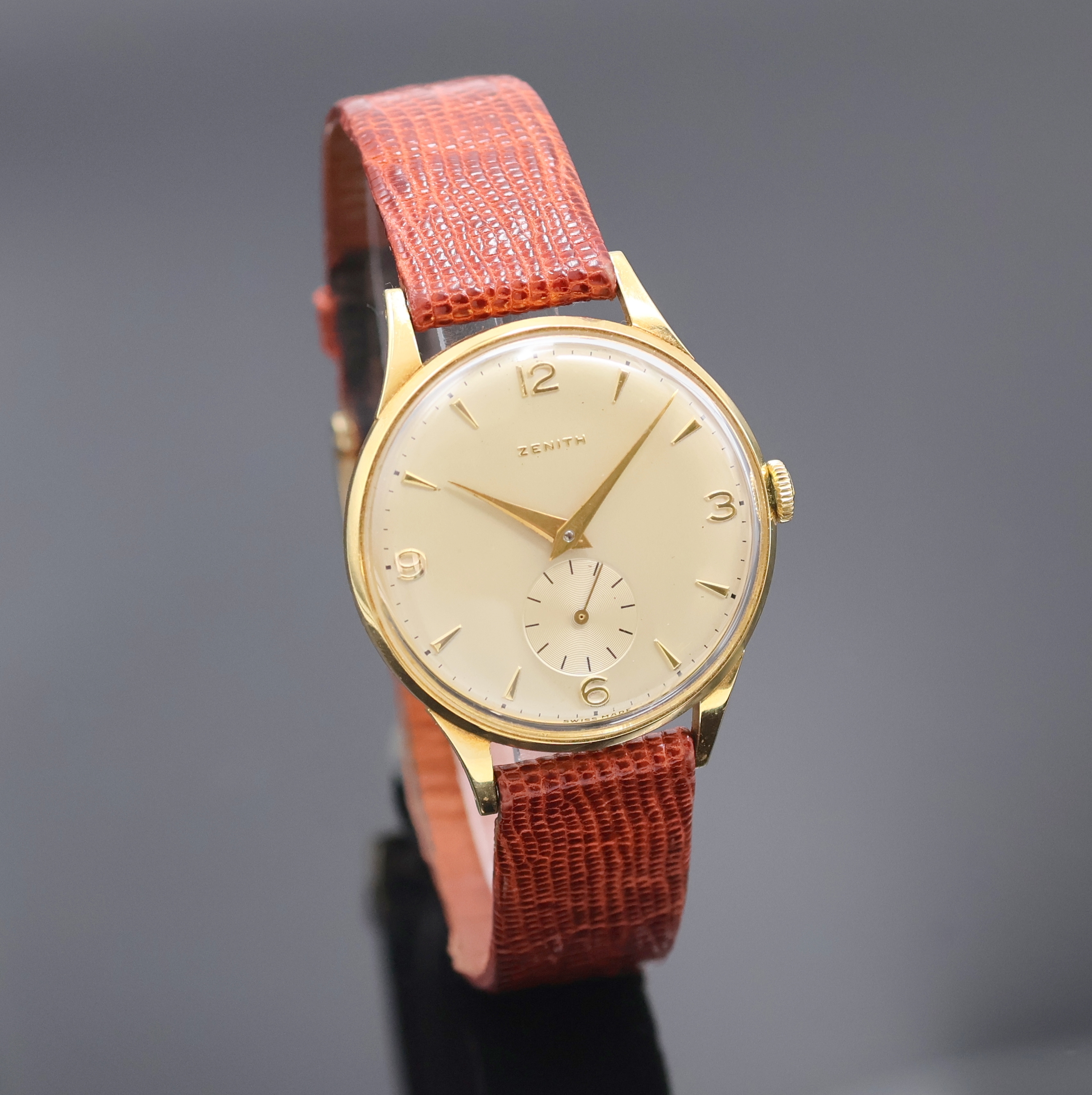 Detail b: ZENITH Armbanduhr in GG 750/000, Schweiz um 1950, Handaufzug, 2-teil. Geh., Boden aufgedr., orig. Krone, versilb. Zifferbl., gold. Indizes u. Zahlen, ...