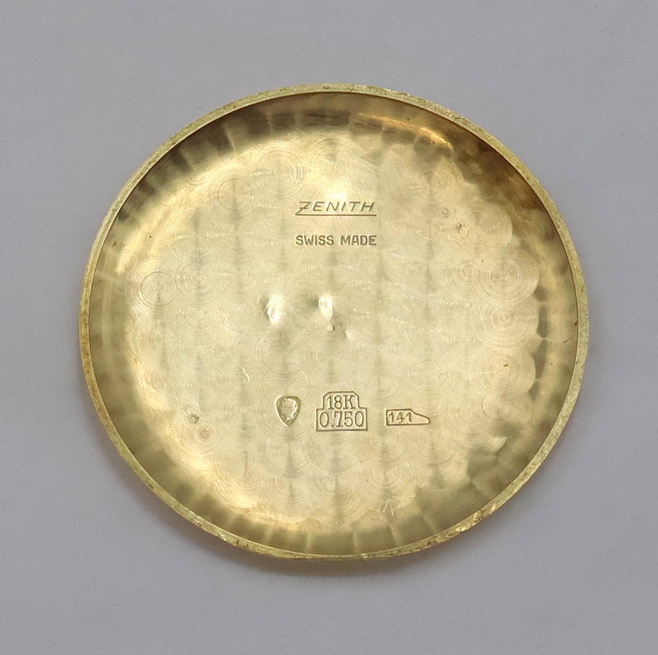 Detail h: ZENITH Armbanduhr in GG 750/000, Schweiz um 1950, Handaufzug, 2-teil. Geh., Boden aufgedr., orig. Krone, versilb. Zifferbl., gold. Indizes u. Zahlen, ...