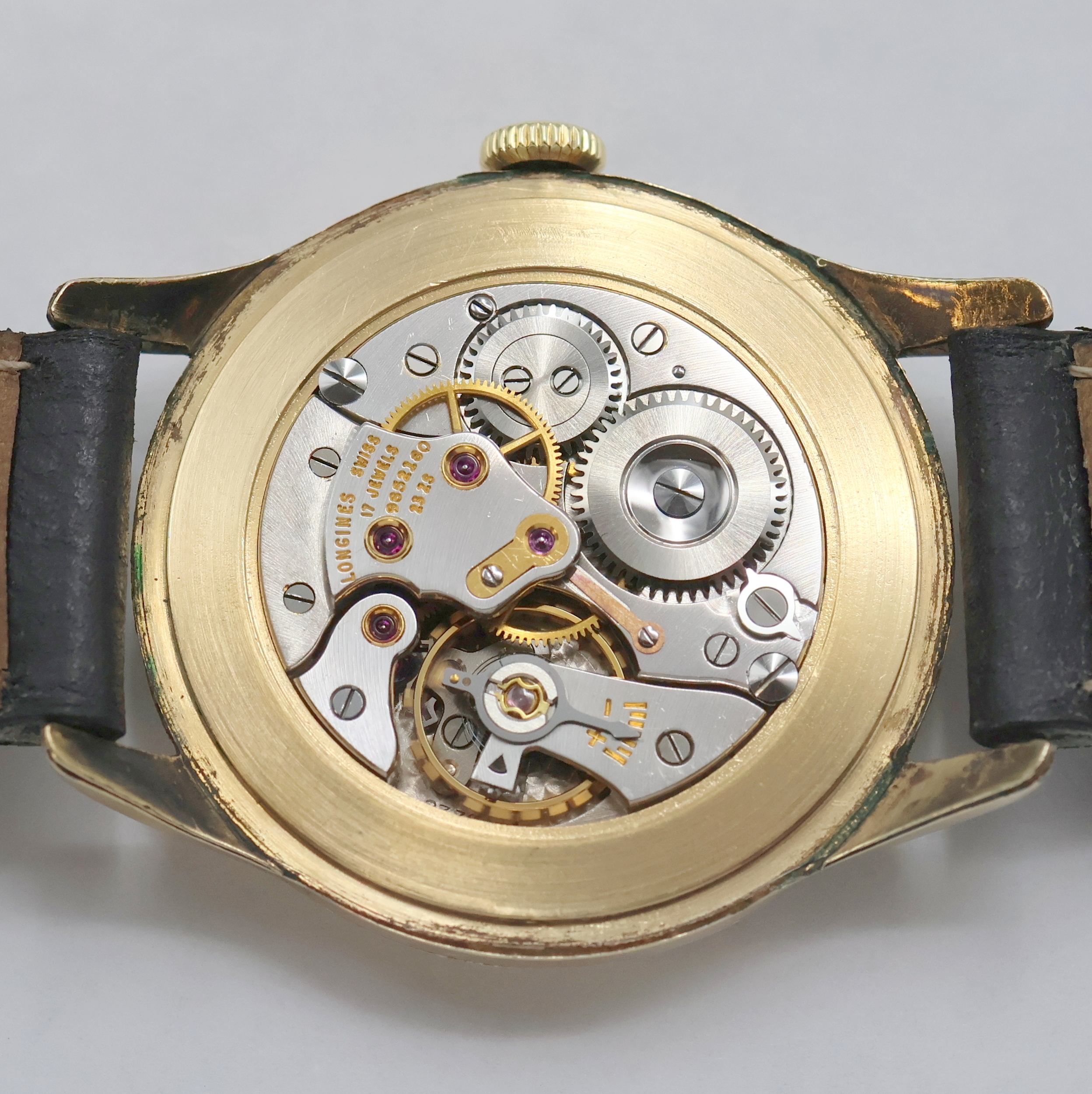 Detail f: Longines vergoldete Herrenarmbanduhr Referenz 6393, Schweiz um 1955, Handaufzug, 3-teil. Geh., Stahlboden aufgedr., versilb. Zifferbl. m. guill. ...